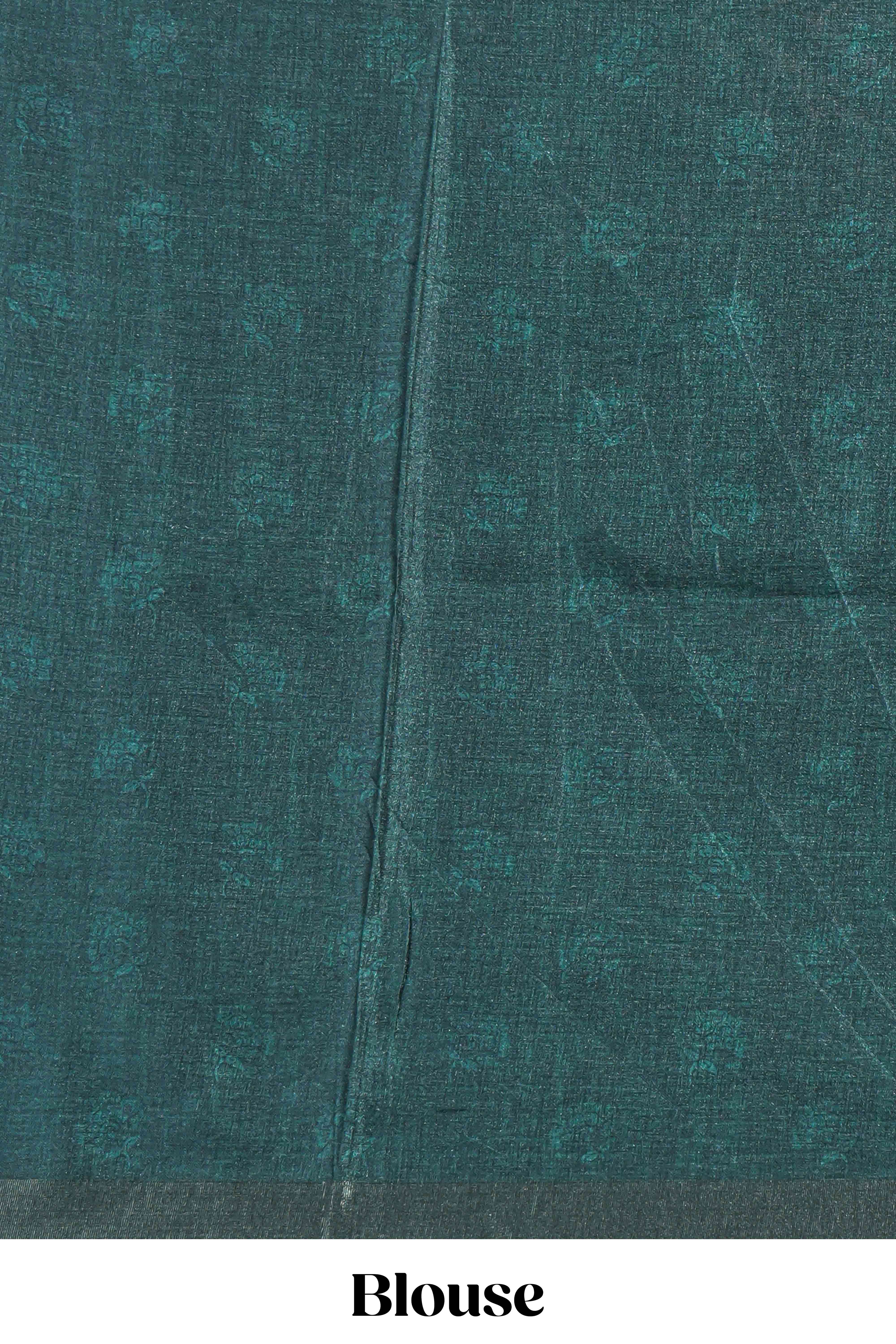 Green floral design tussar saree with self zari border and matching blouse