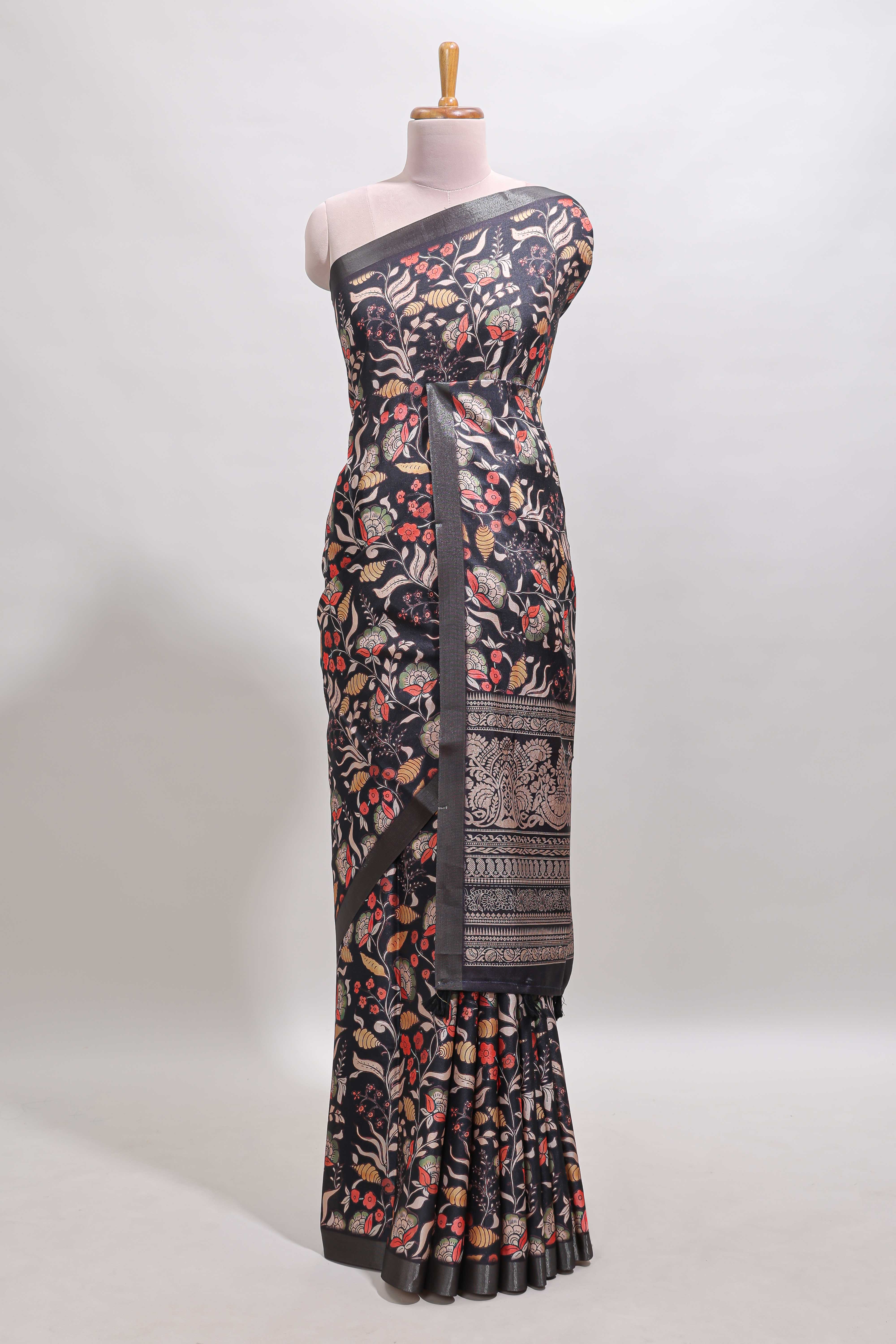 Black floral design tussar saree with self zari border and matching blouse