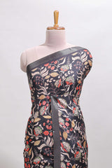 Black floral design tussar saree with self zari border and matching blouse