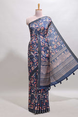 Blue floral design tussar saree with self zari border and matching blouse