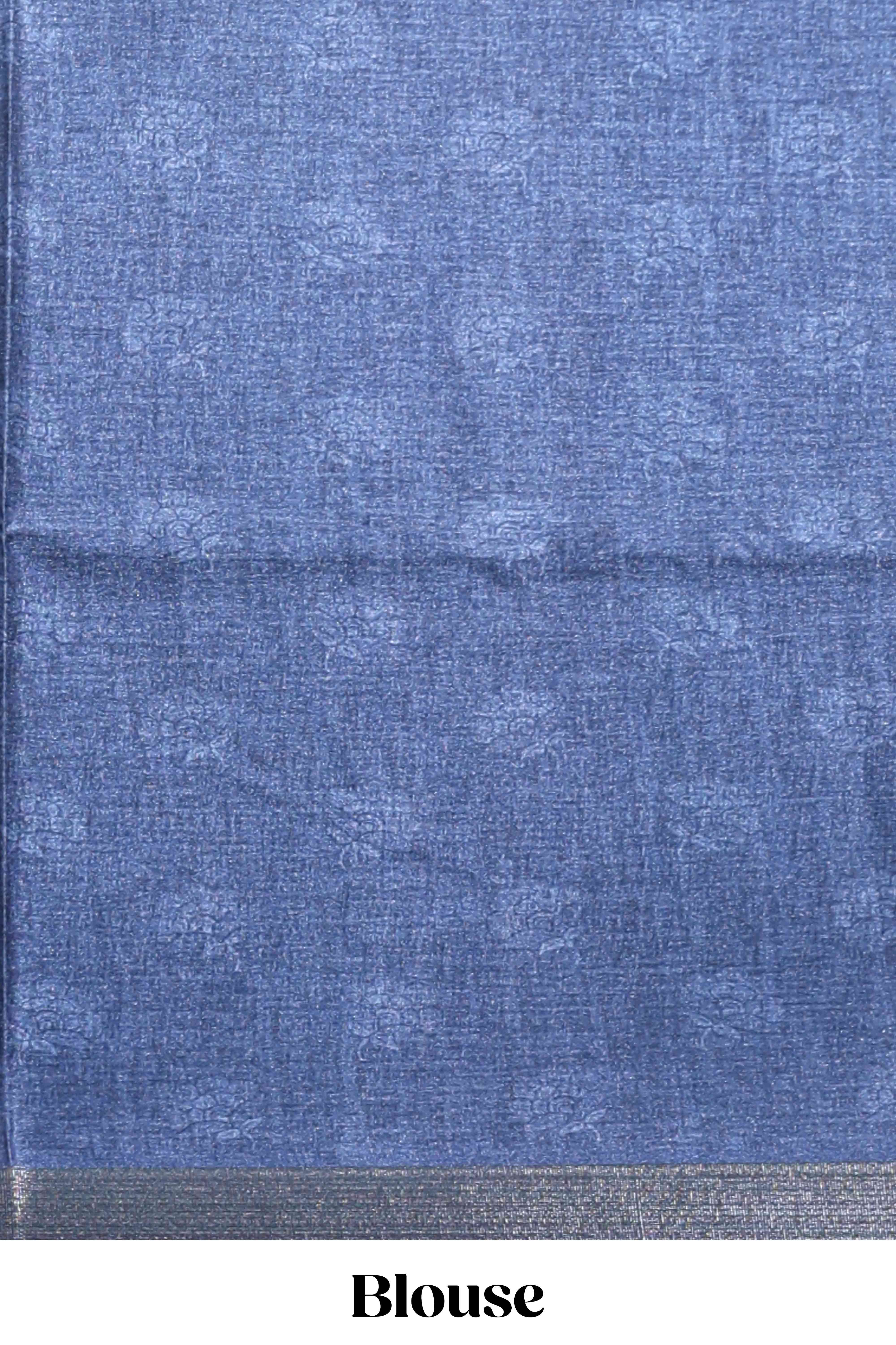 Blue floral design tussar saree with self zari border and matching blouse