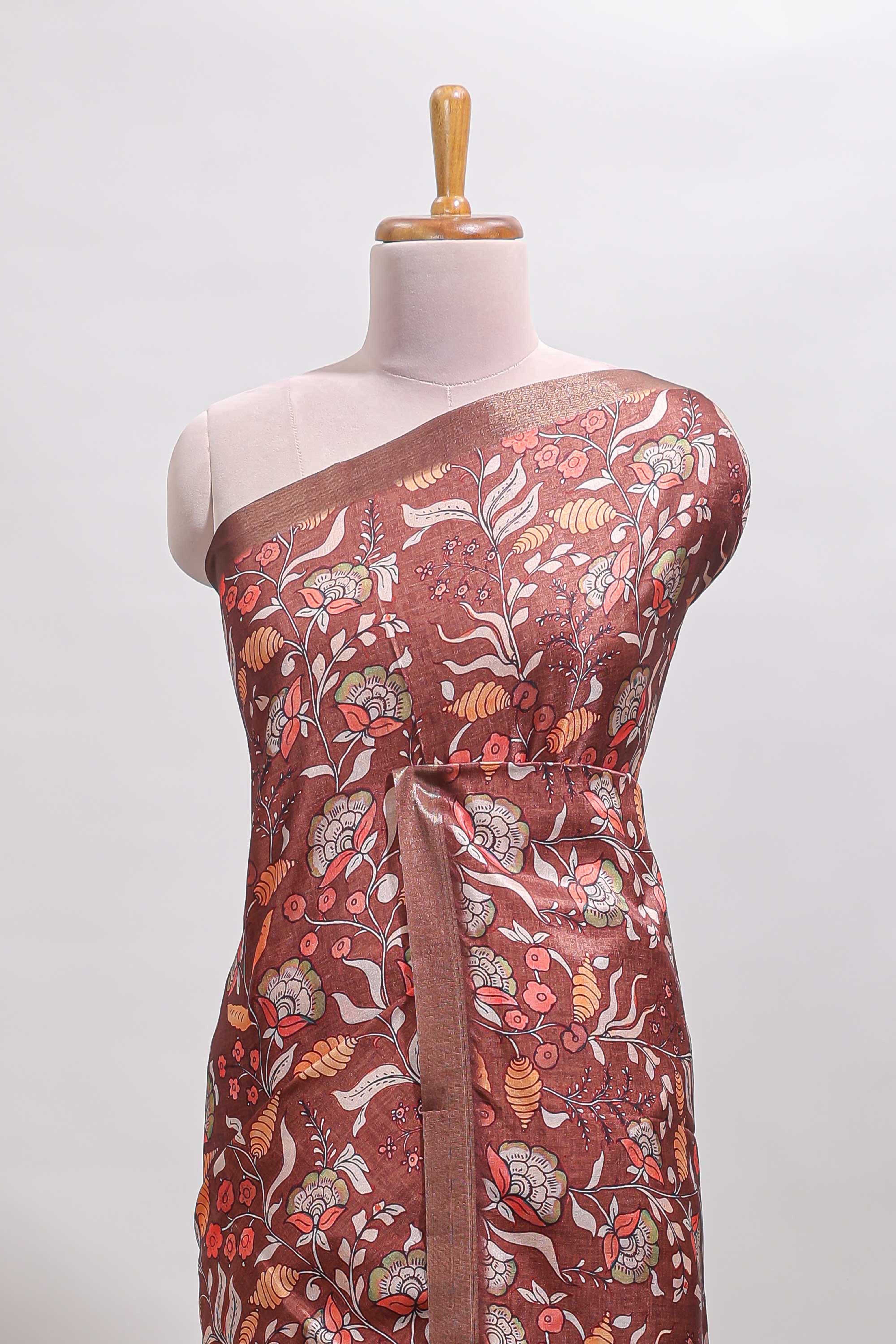 Brown floral design tussar saree with self zari border and matching blouse