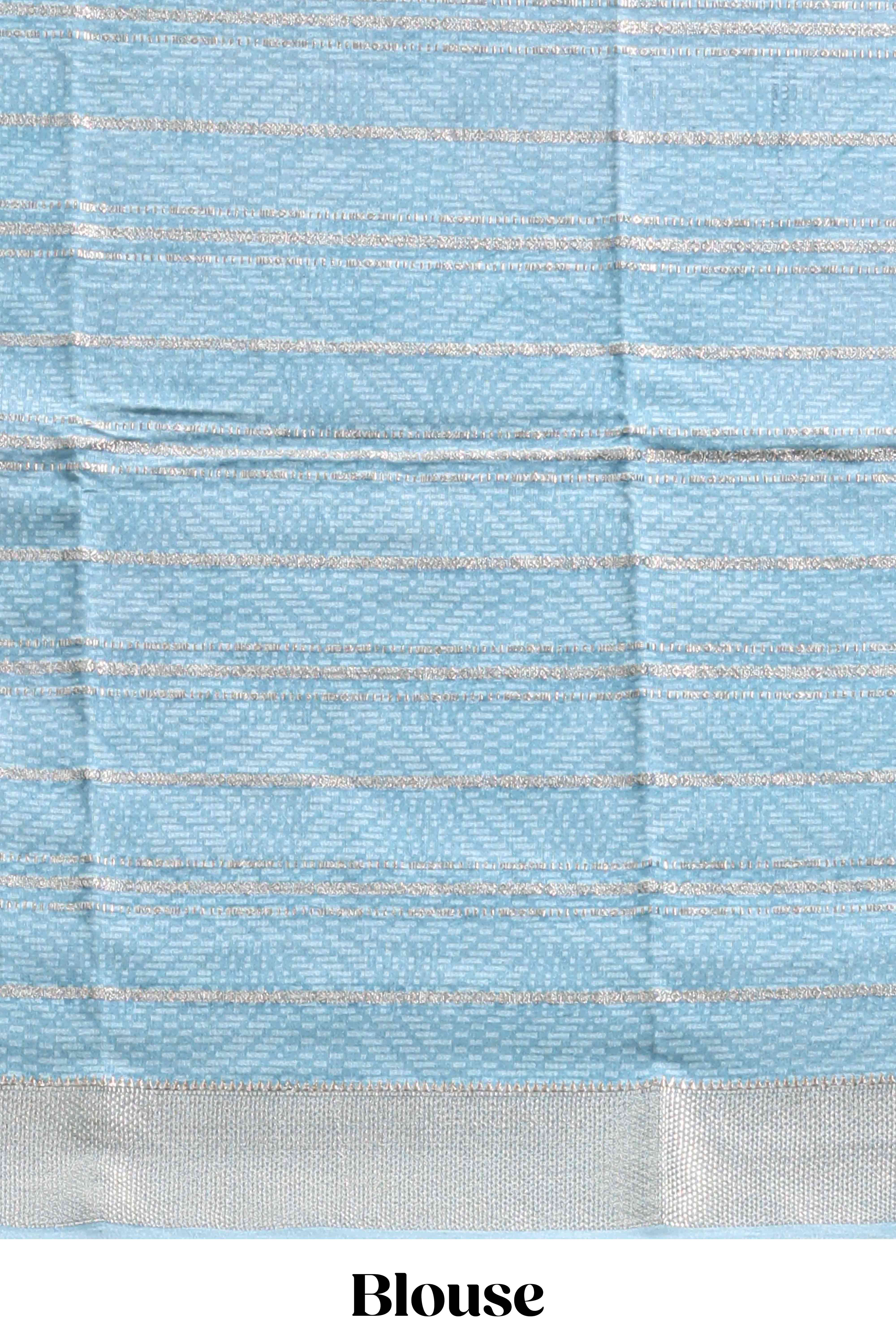 Baby pink geometric design tussar saree with contrast zari border and striped blouse
