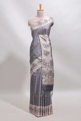 Grey checked tussar saree with contrast traditional elephant border and matching blouse