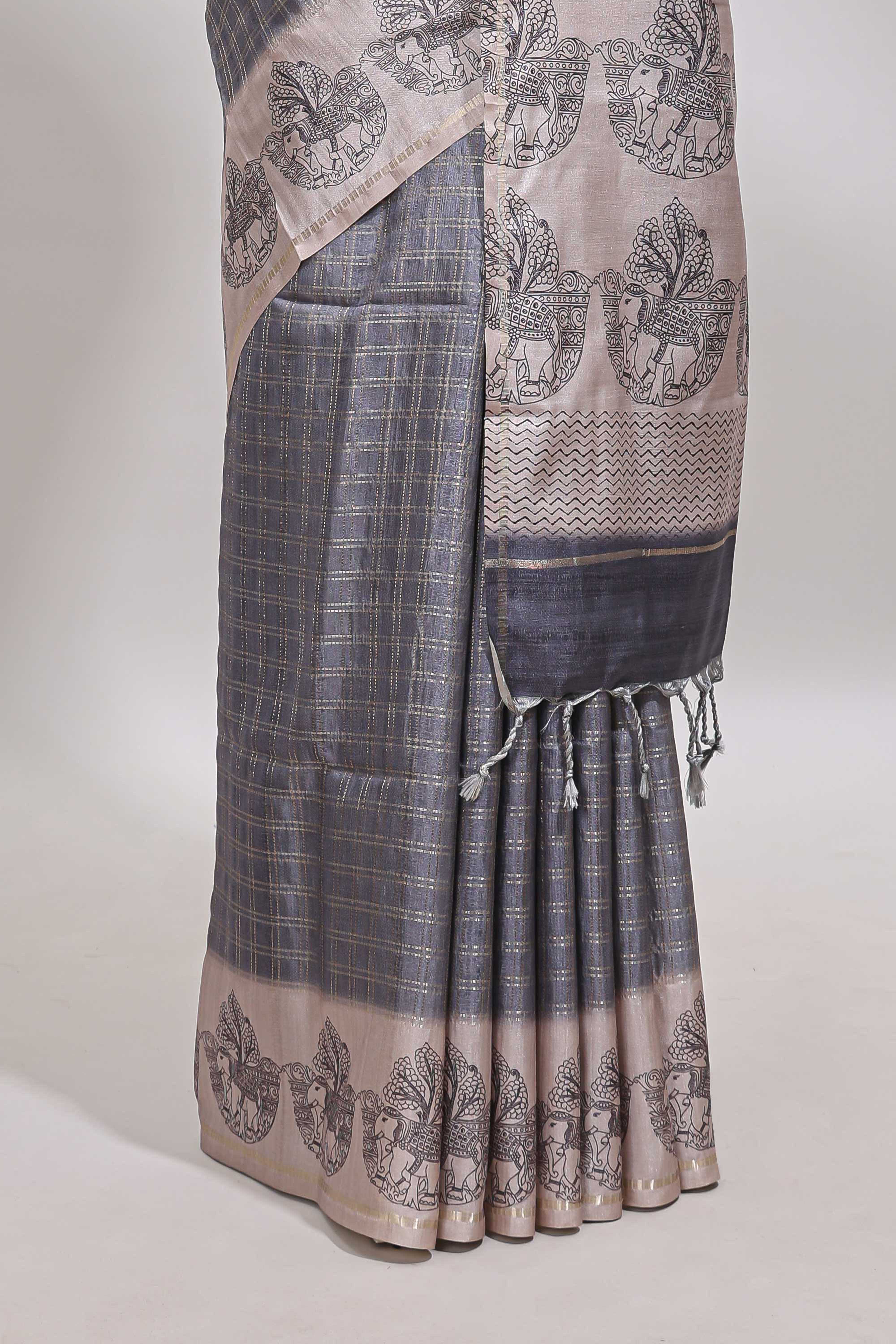 Grey checked tussar saree with contrast traditional elephant border and matching blouse