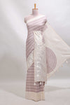 Cream striped tussar saree with contrast border and matching printed blouse