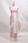 Cream striped tussar saree with contrast border and matching printed blouse