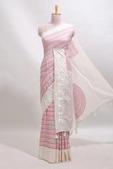 Cream striped tussar saree with contrast border and matching printed blouse