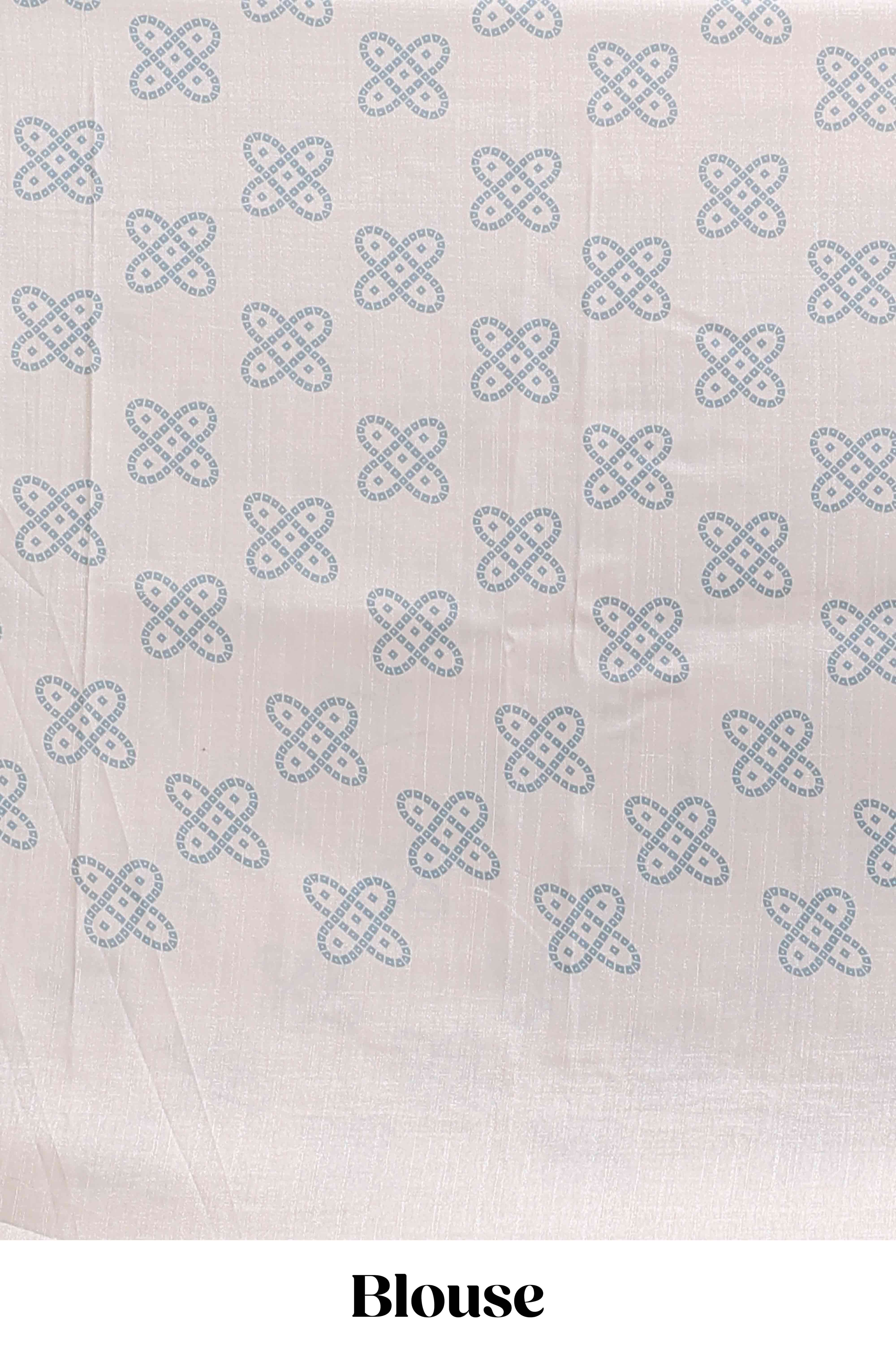 Cream striped tussar saree with contrast border and matching printed blouse