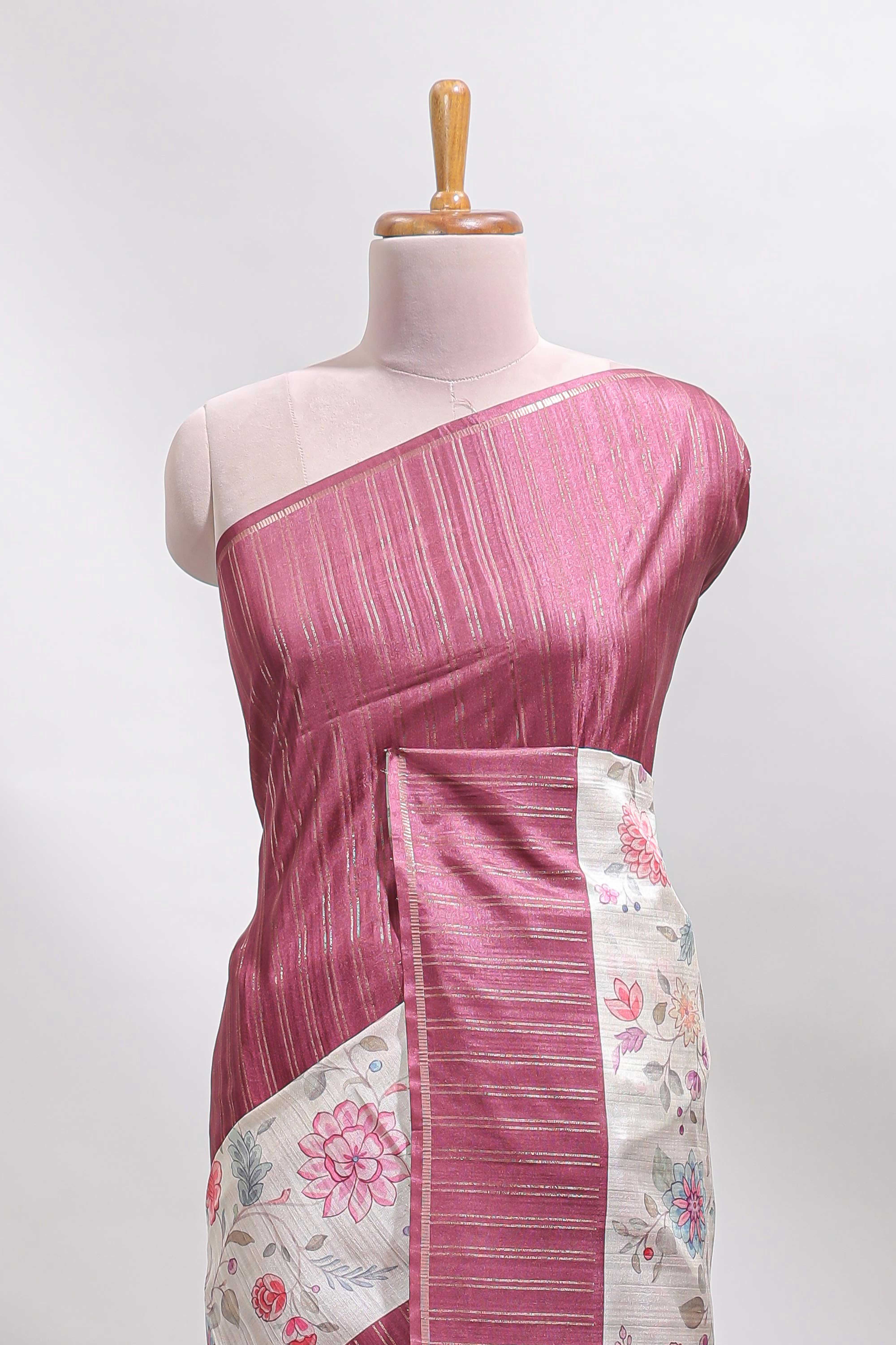 Cream floral design tussar saree with contrast border and floral print blouse