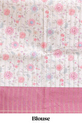 Cream floral design tussar saree with contrast border and floral print blouse