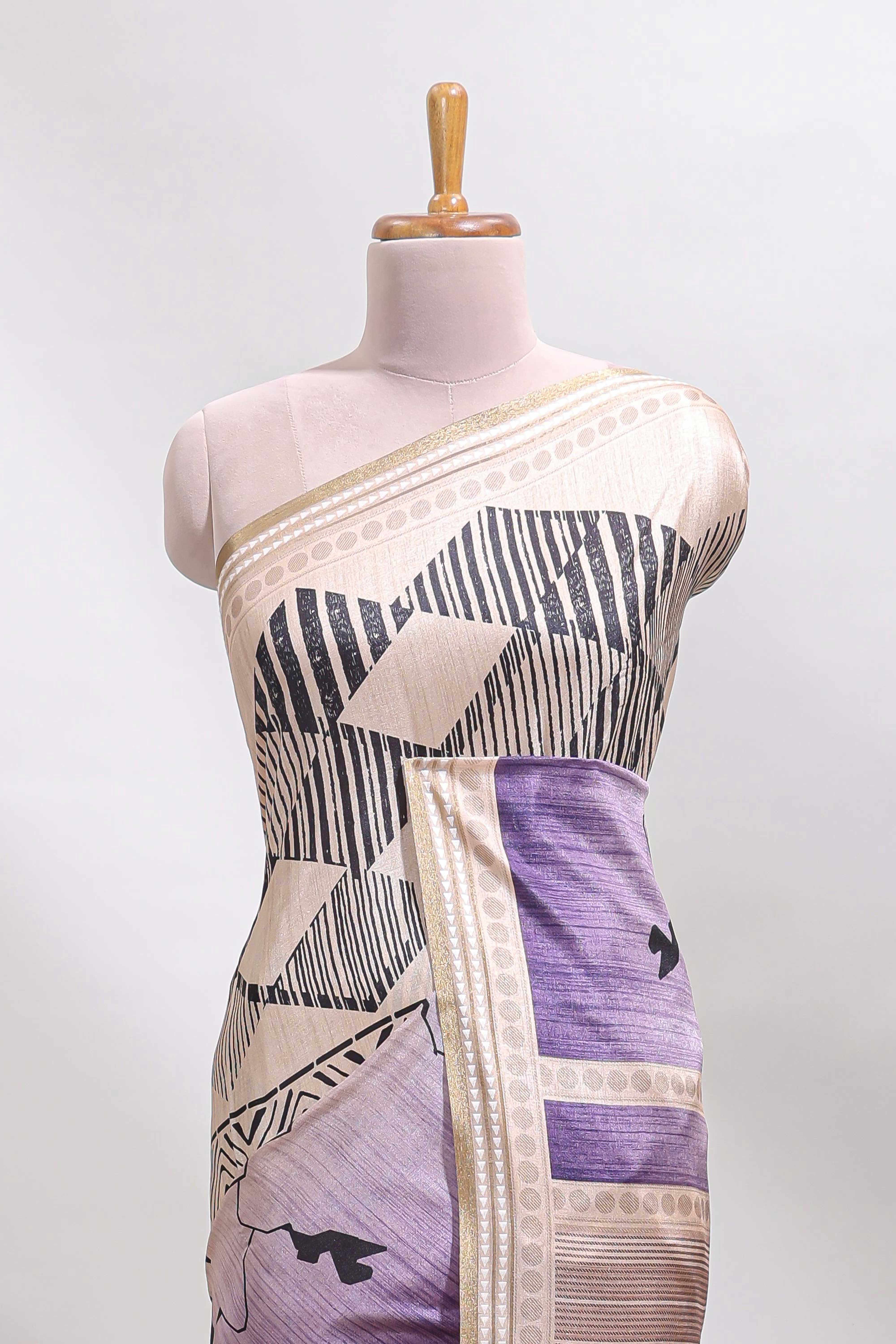 Beige geometric design tussar saree with self border and matching blouse