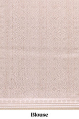 Beige geometric design tussar saree with self border and matching blouse