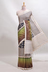 Beige geometric design tussar saree with self border and matching blouse