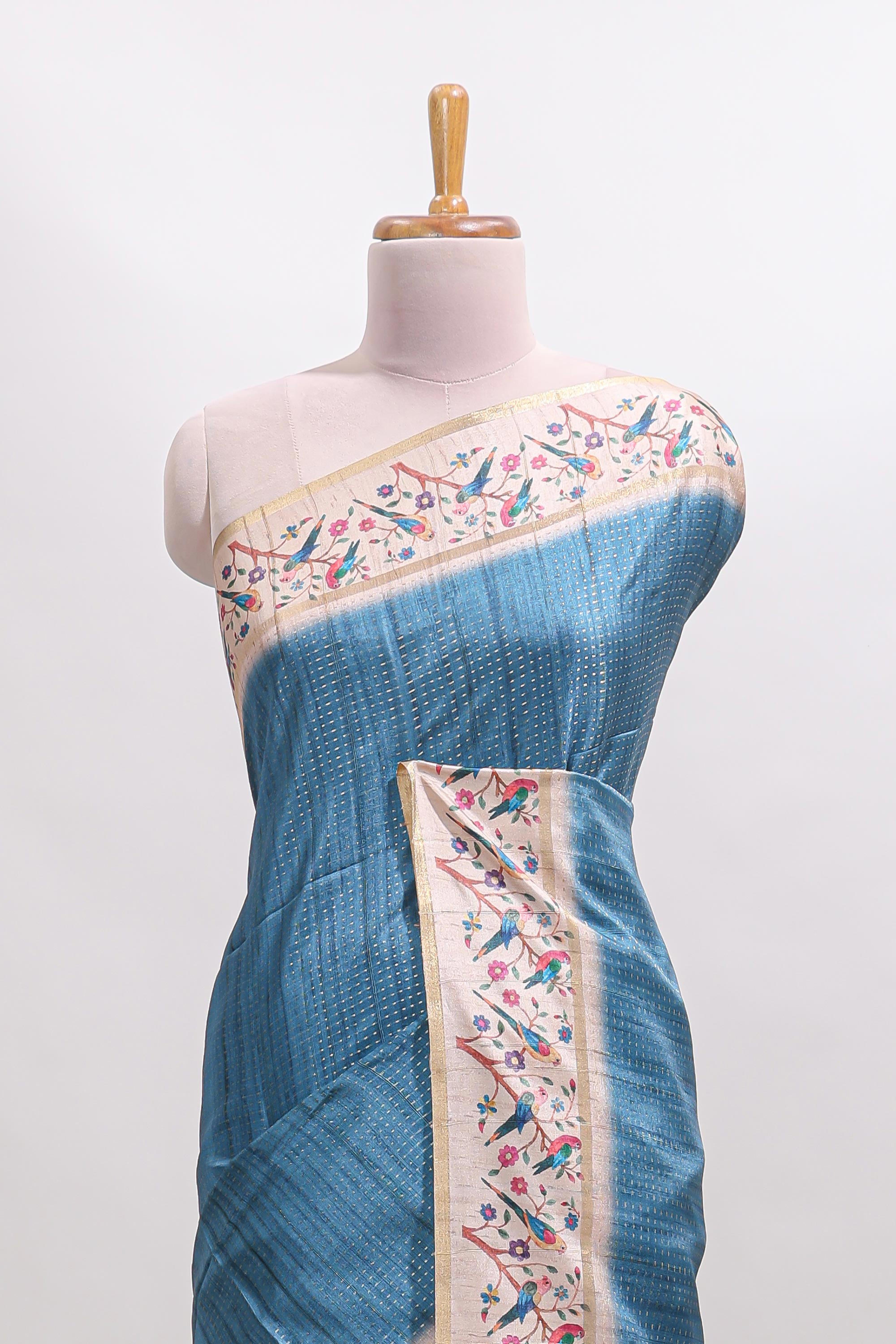 Blue striped tussar saree with contrast birds & floral design border and floral printed blouse