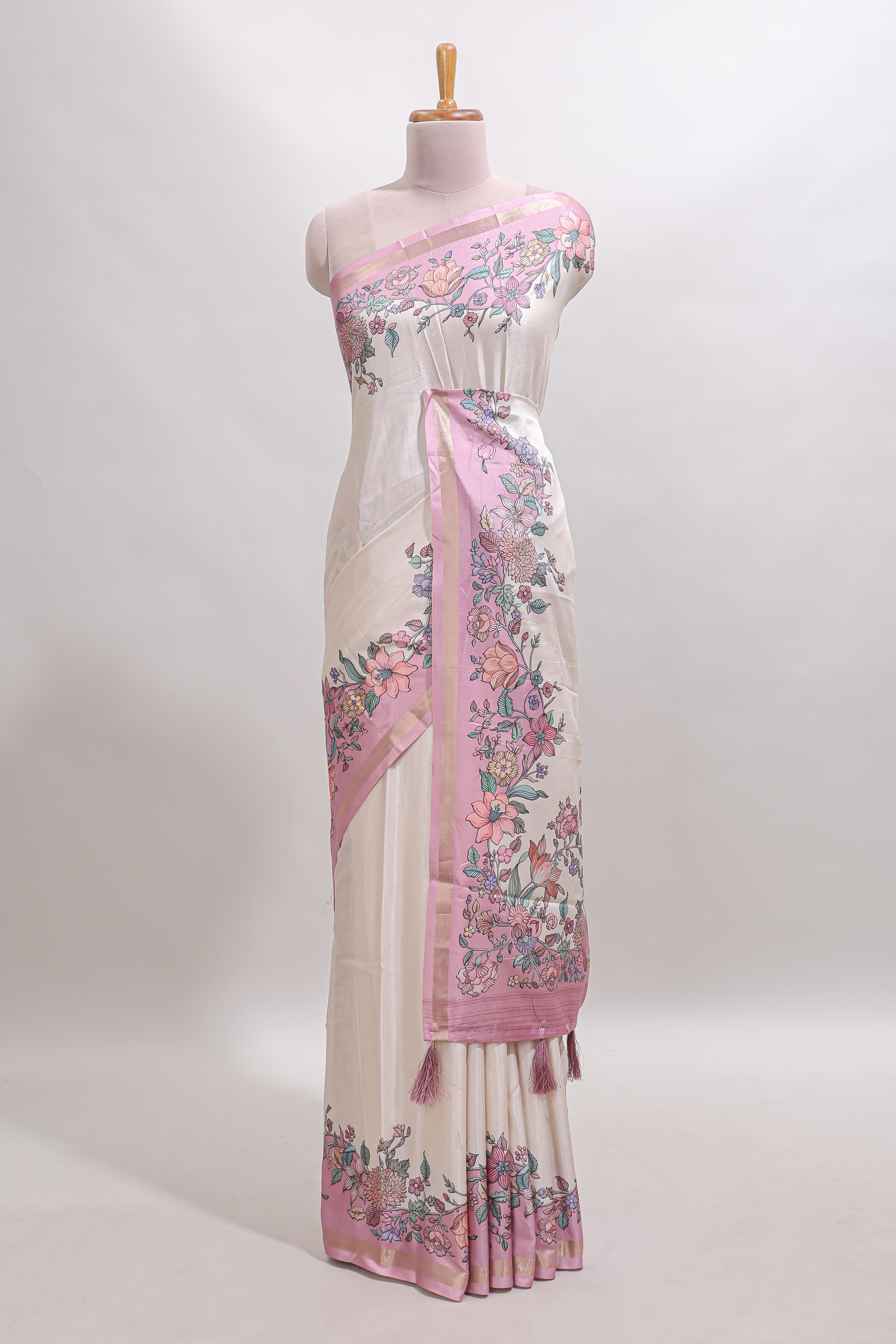 Cream floral design tussar saree with contrast zari border and self pallu