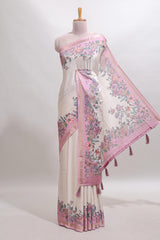 Cream floral design tussar saree with contrast zari border and self pallu