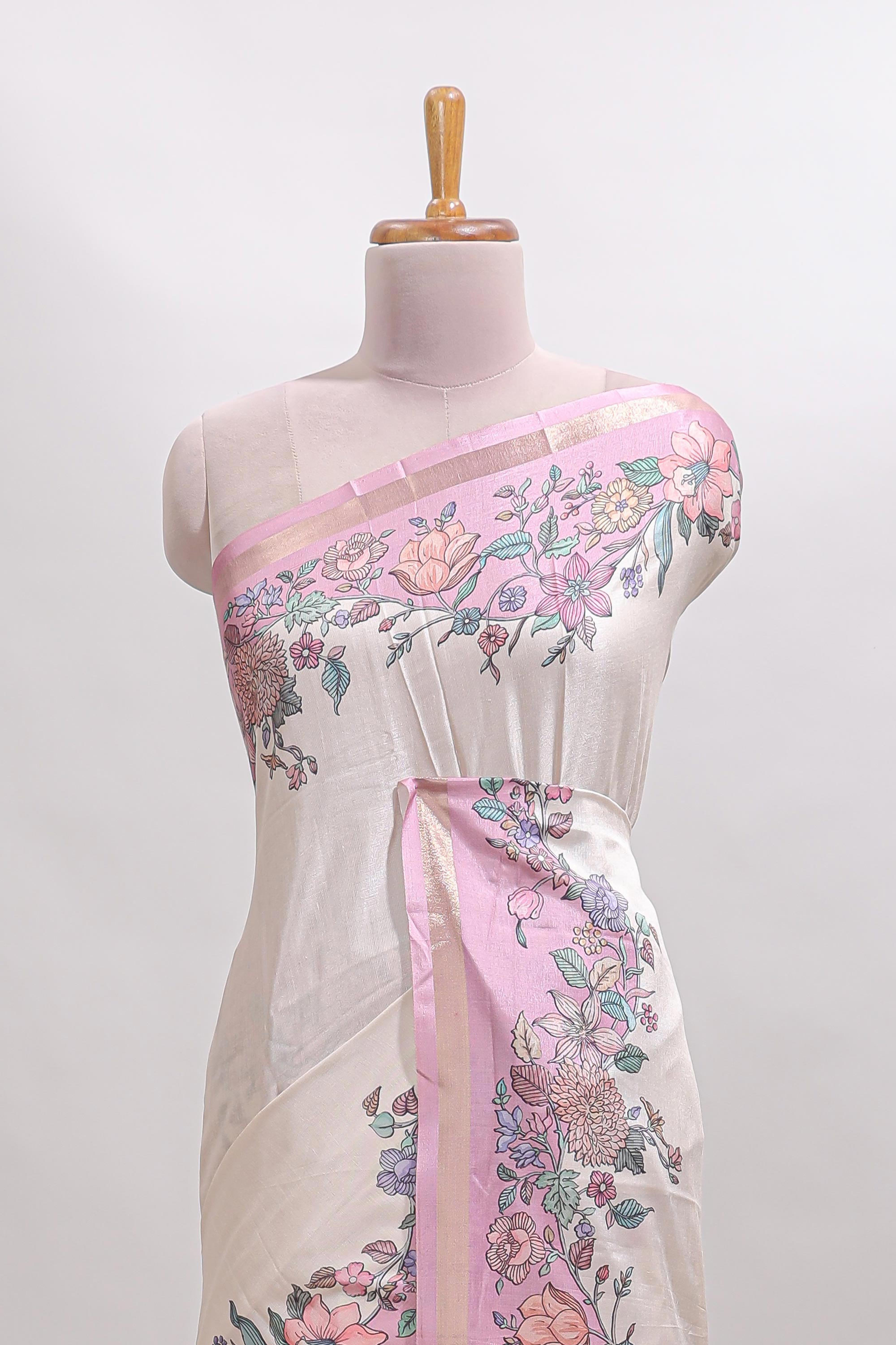 Cream floral design tussar saree with contrast zari border and self pallu