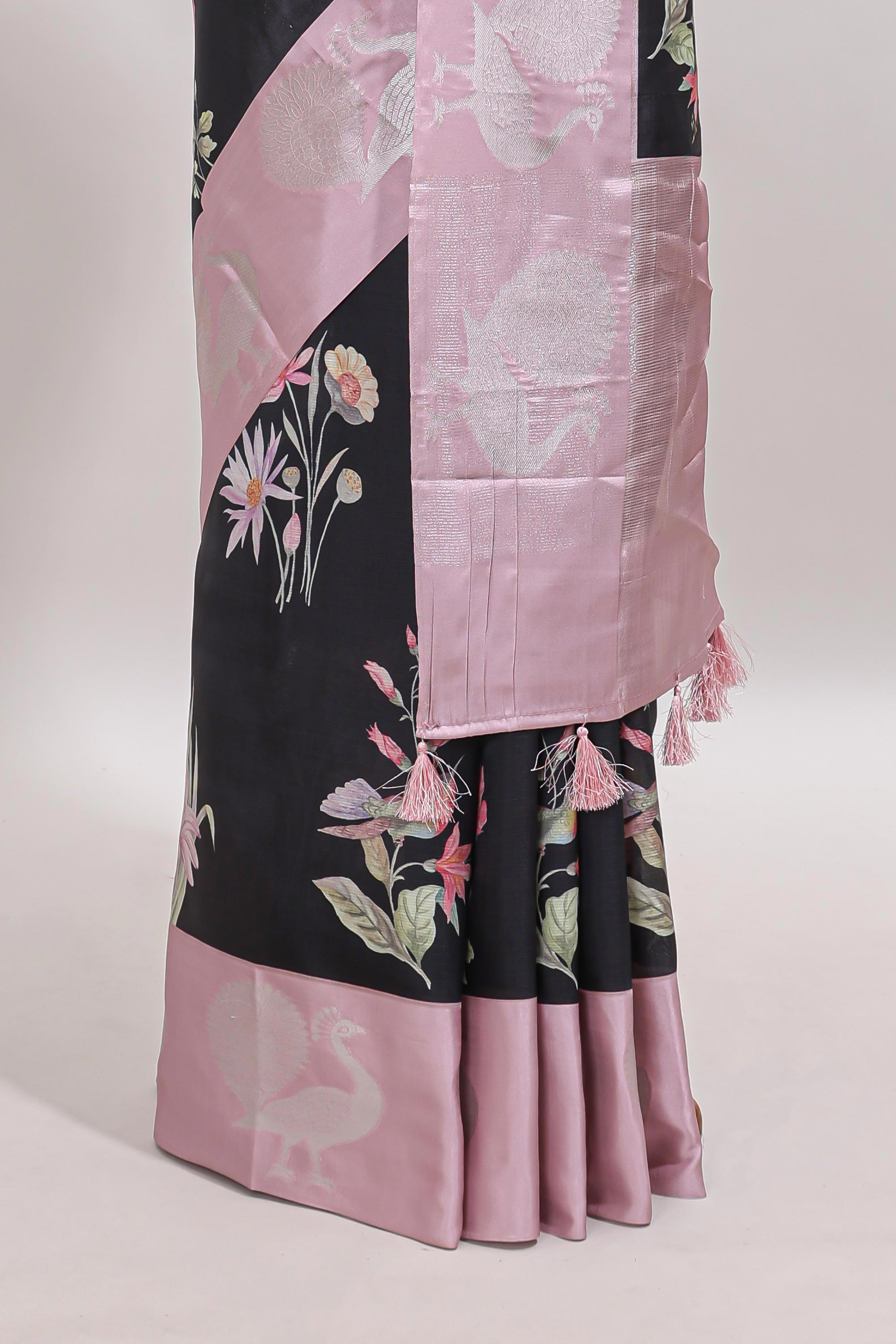 Black floral design tussar saree with contrast peacock design zari border and blouse