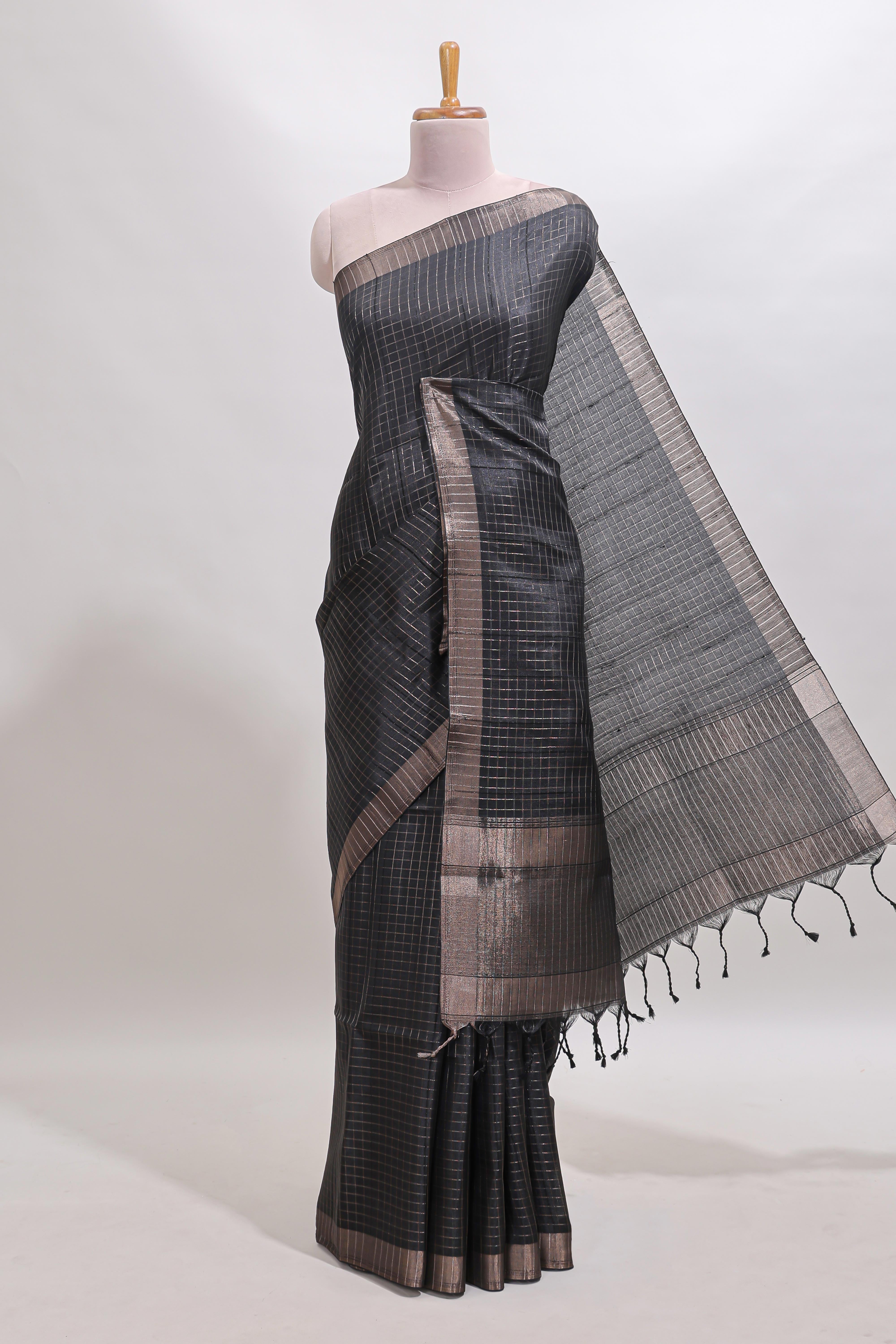 Black checked tussar saree with self zari border and matching striped blouse