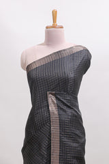 Black checked tussar saree with self zari border and matching striped blouse