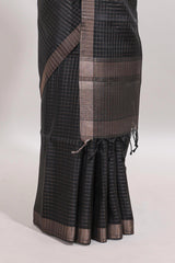 Black checked tussar saree with self zari border and matching striped blouse