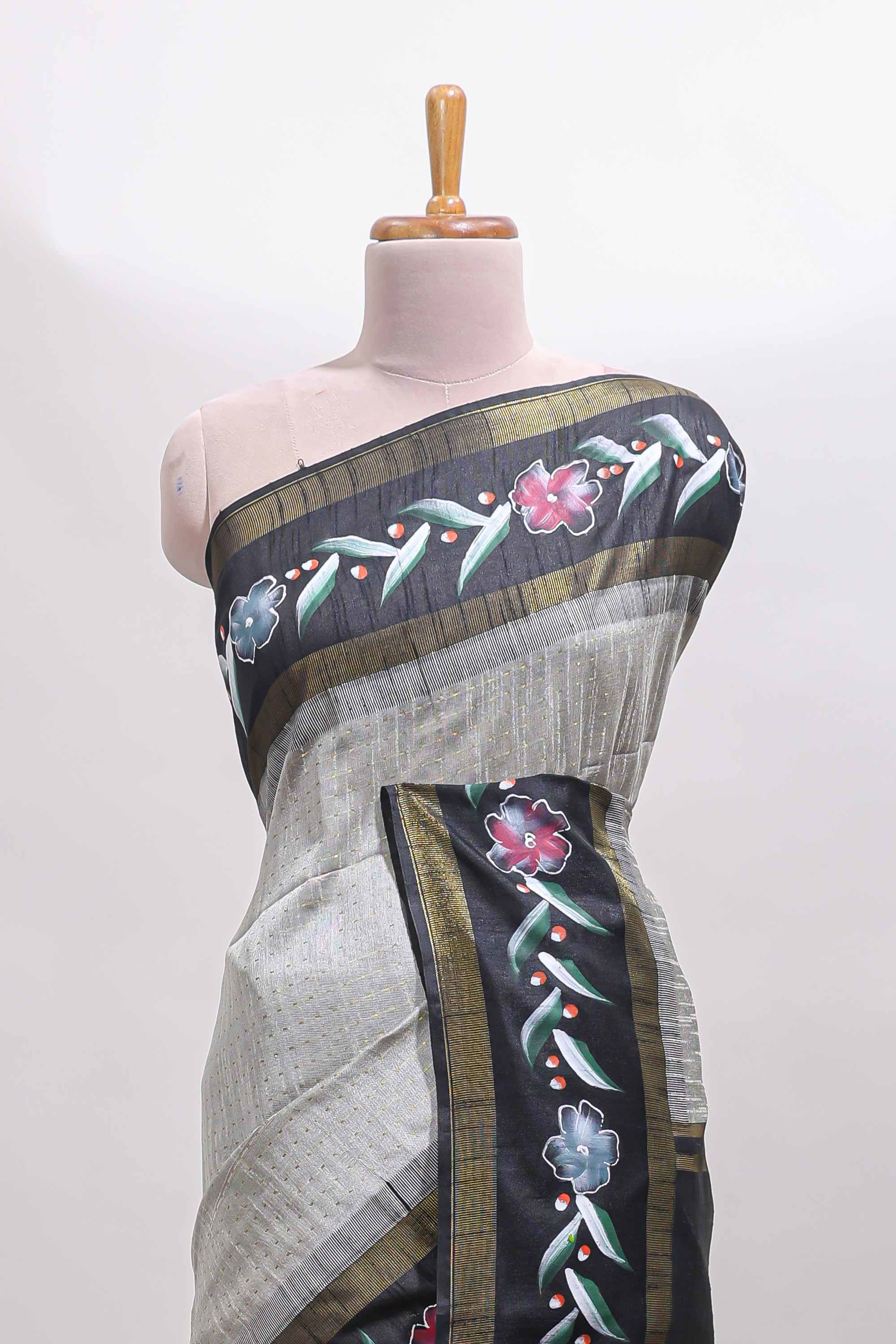 Grey zari design tussar saree with contrast floral print border and blouse