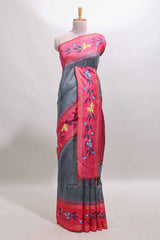 Dark grey zari design tussar saree with contrast floral print border and blouse