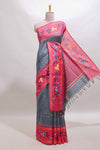 Dark grey zari design tussar saree with contrast floral print border and blouse