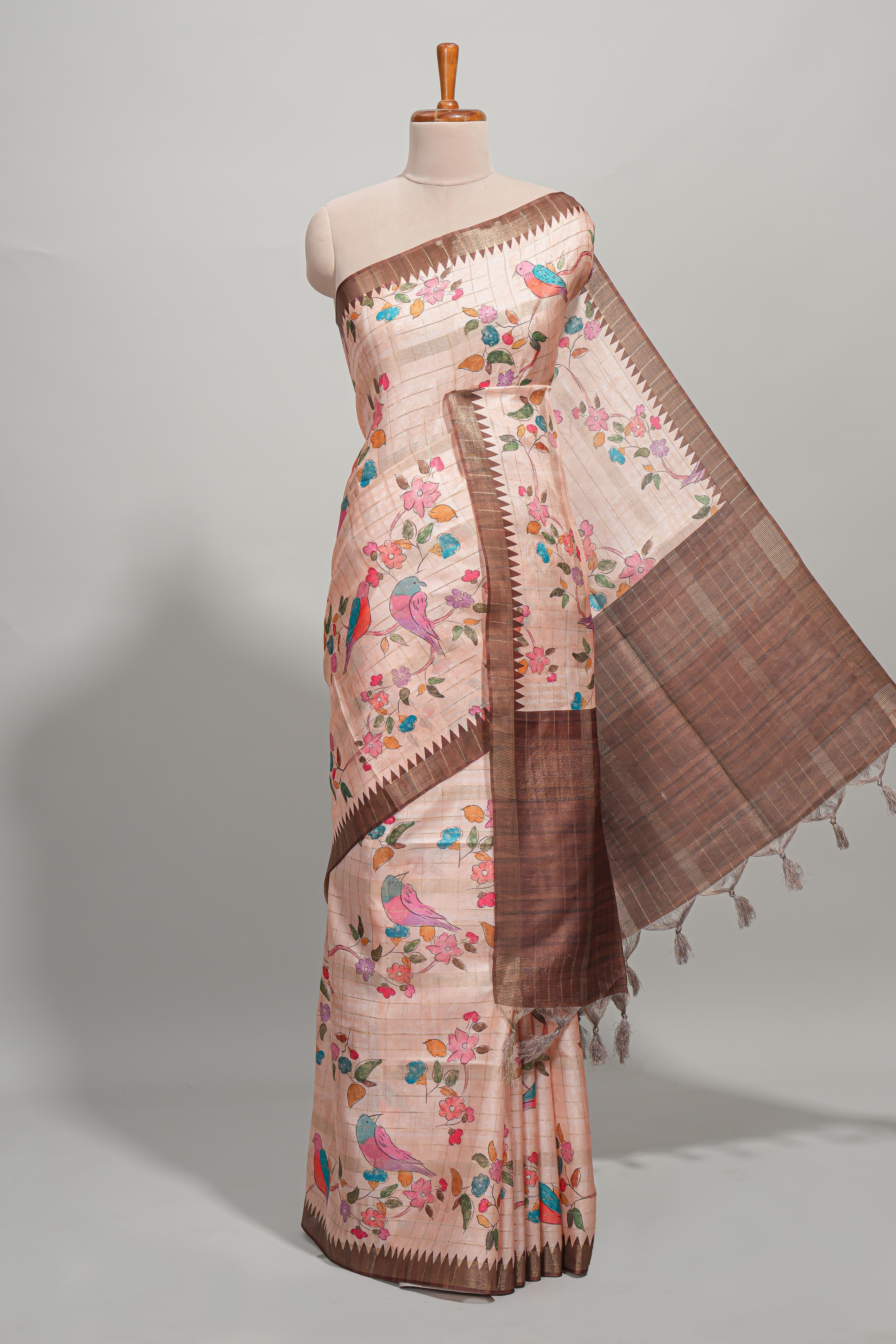 Peach checked birds & floral design semi tussar saree with contrast border and checked blouse