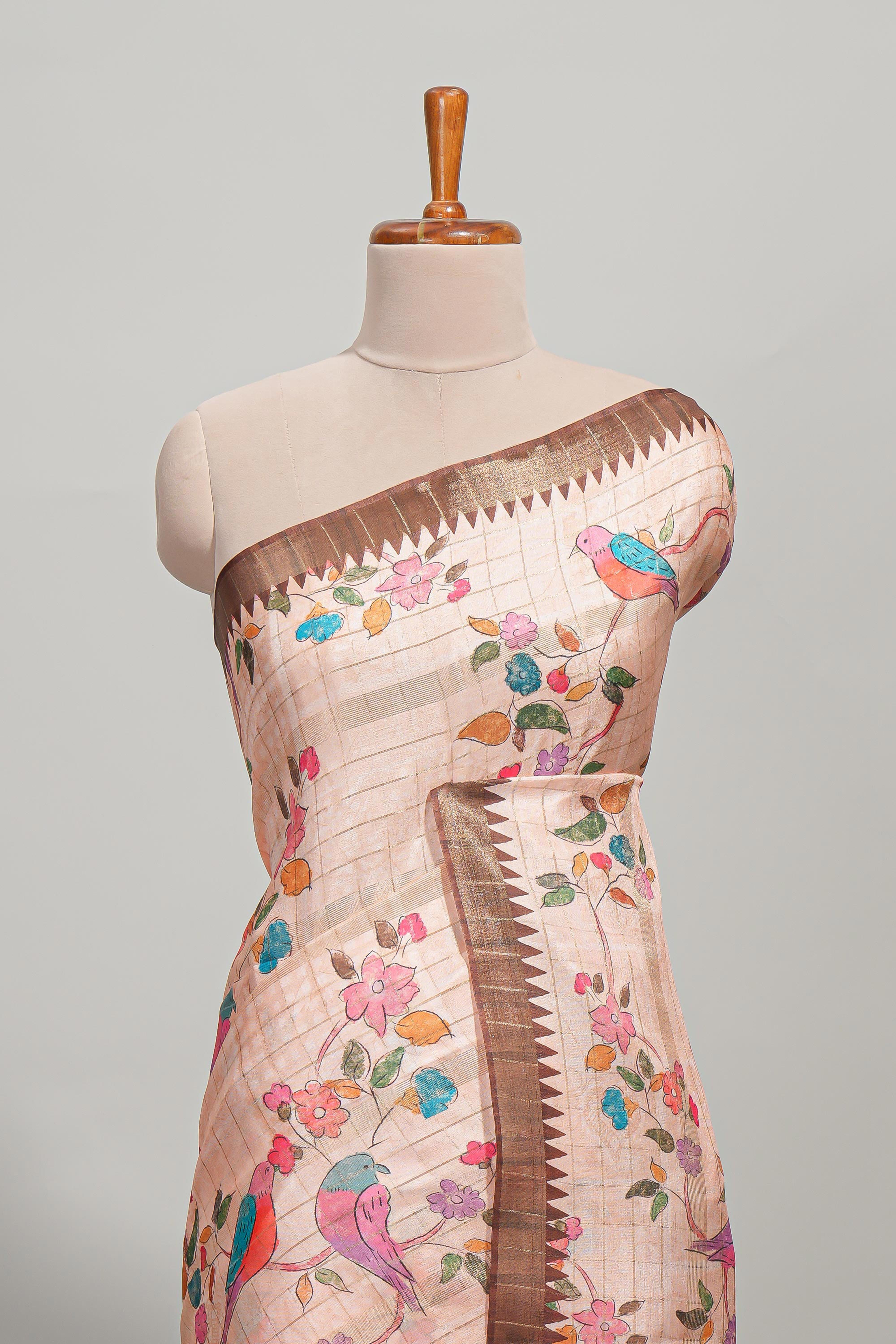 Peach checked birds & floral design semi tussar saree with contrast border and checked blouse