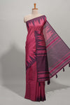 Magenta plain semi tussar saree with contrast geometric border and motifs blouse