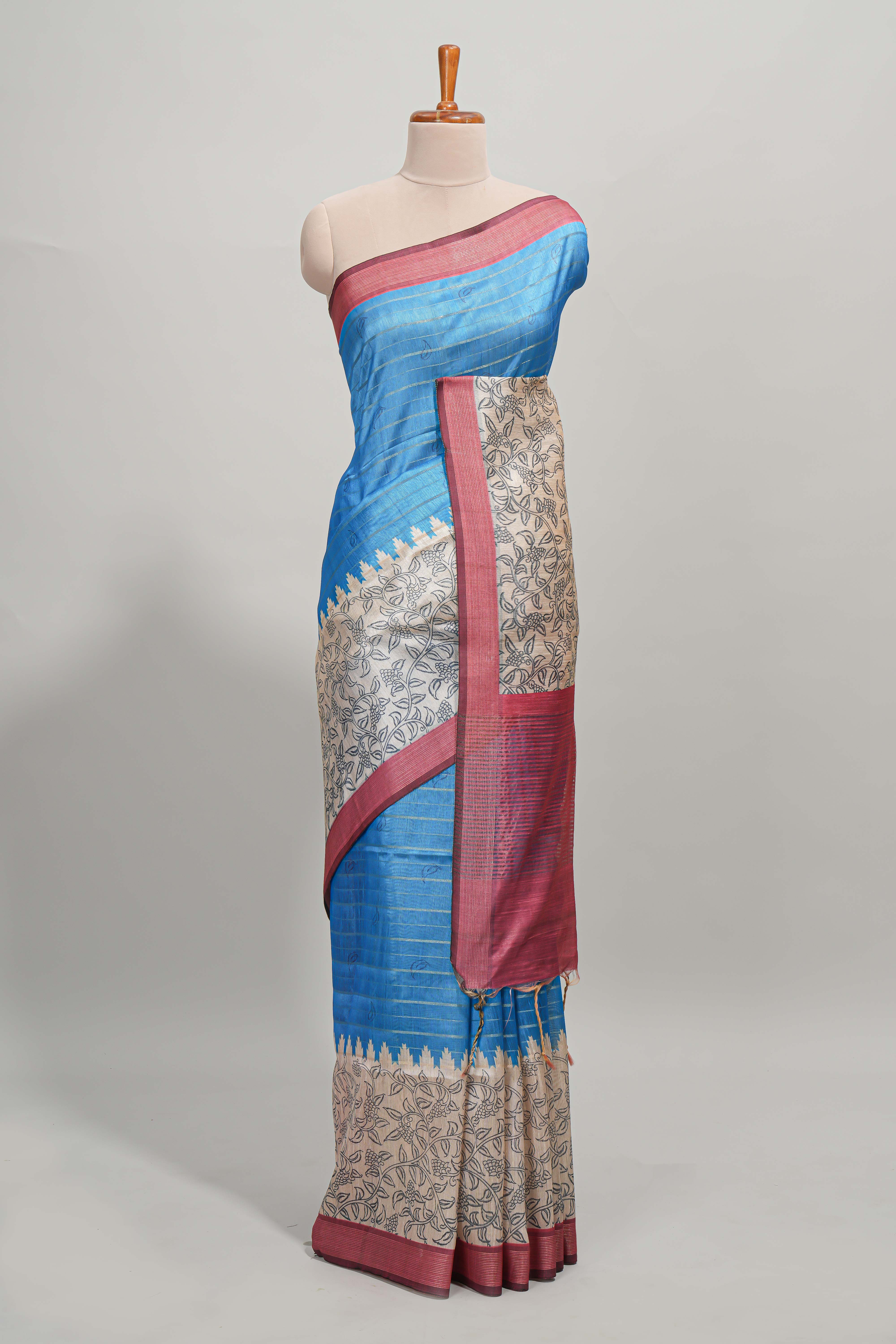 Blue striped floral design semi tussar saree with contrast border and striped blouse