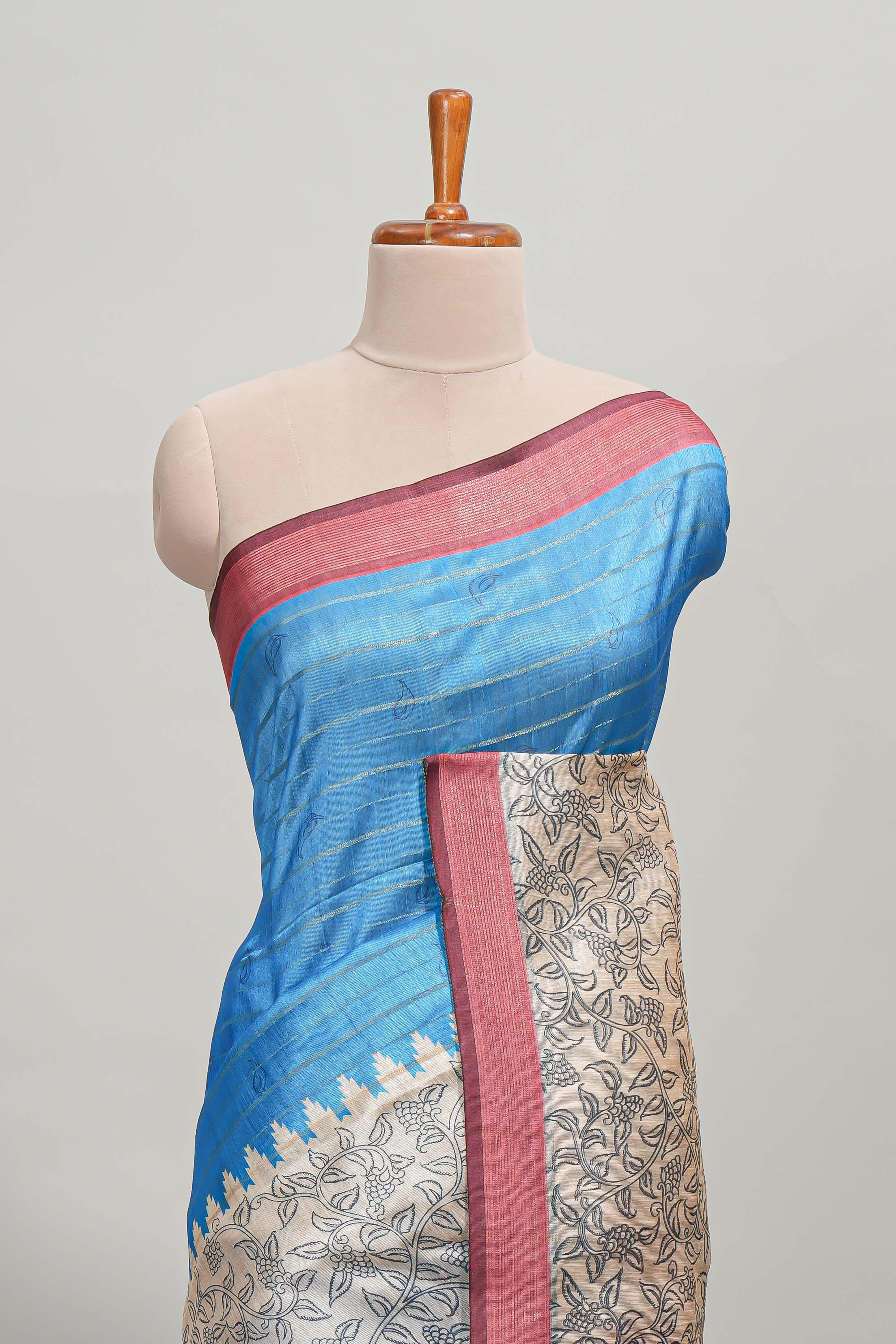 Blue striped floral design semi tussar saree with contrast border and striped blouse