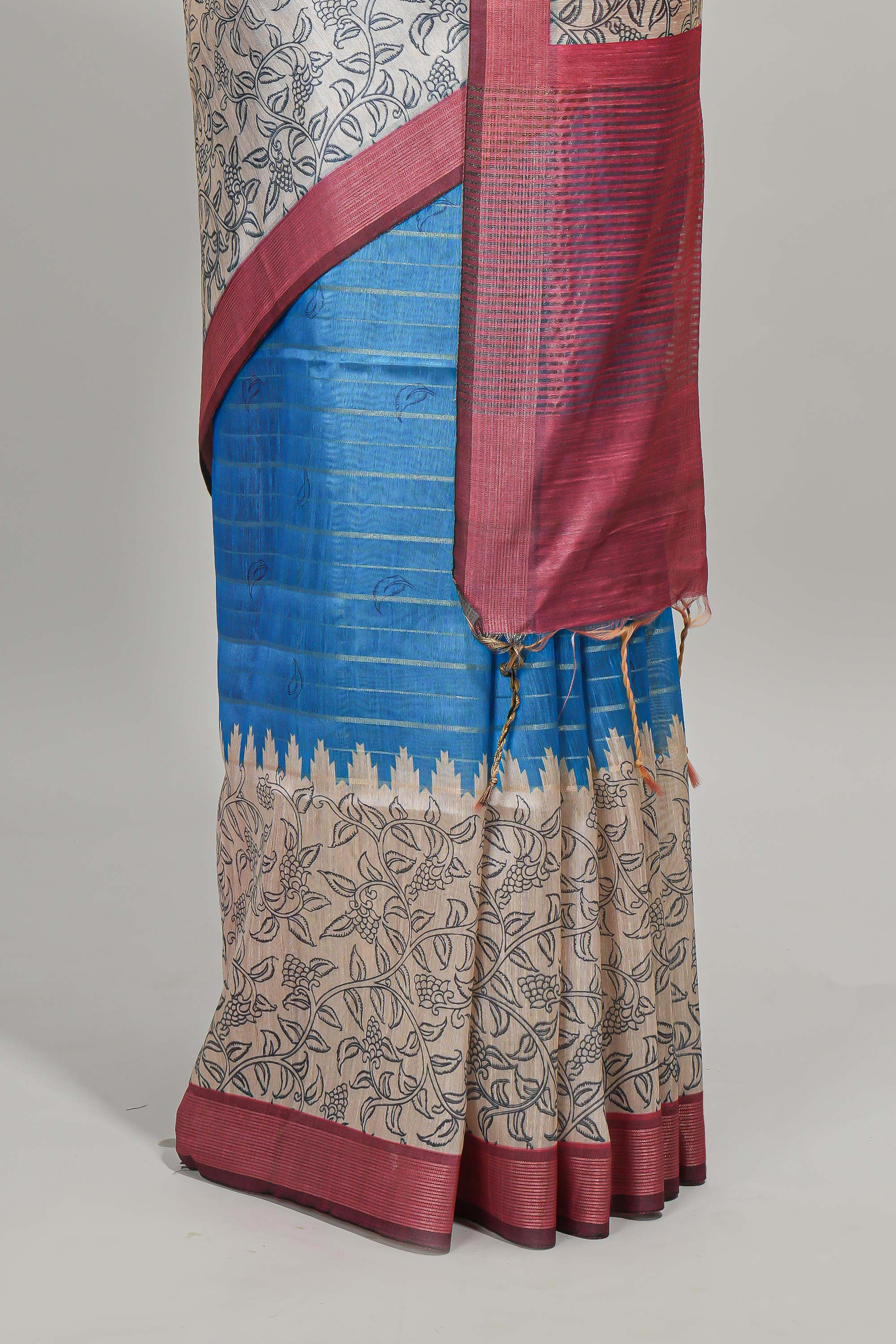 Blue striped floral design semi tussar saree with contrast border and striped blouse