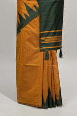 Mustard plain semi tussar saree with contrast geometric border and motifs blouse