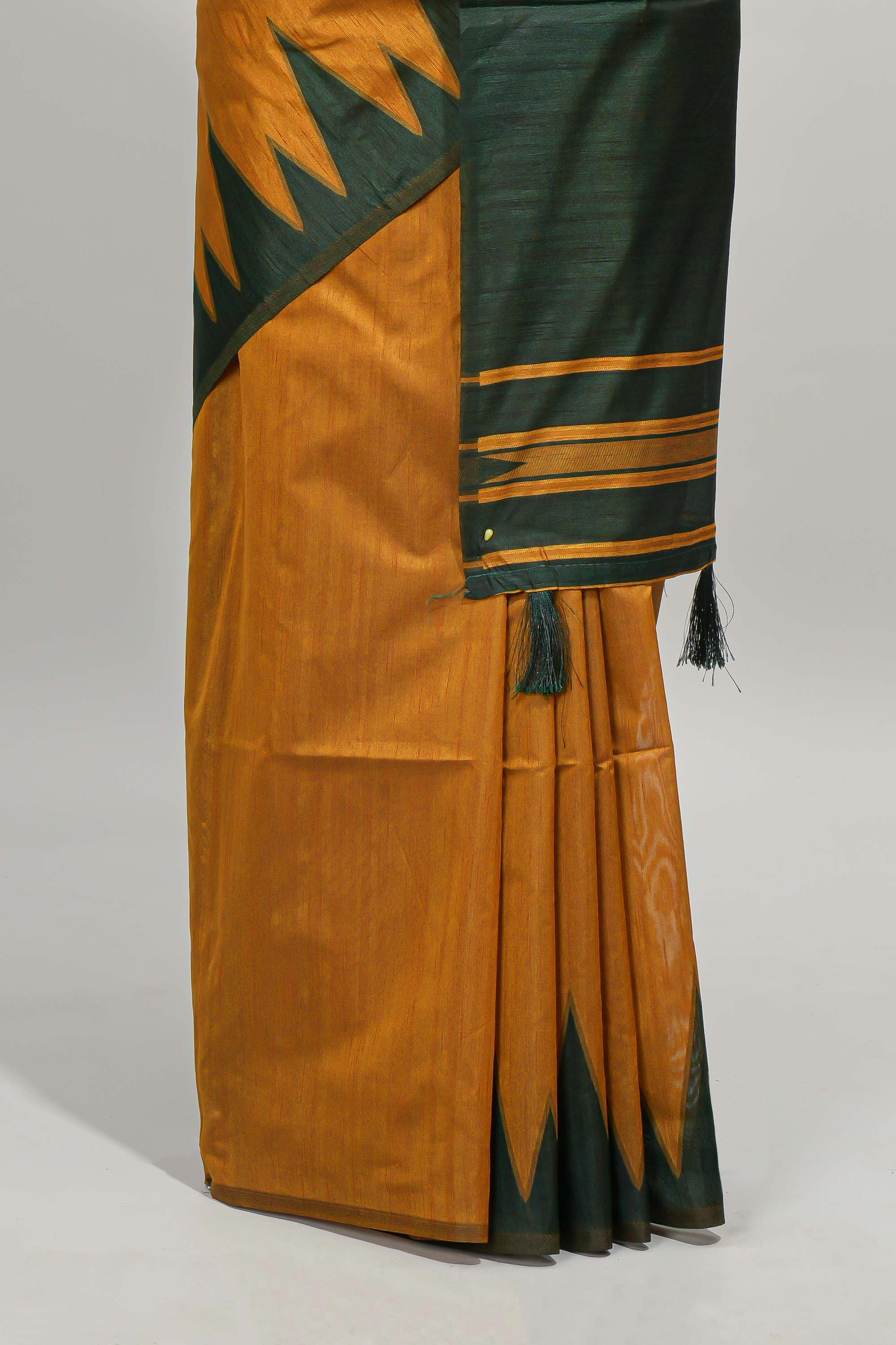 Mustard plain semi tussar saree with contrast geometric border and motifs blouse