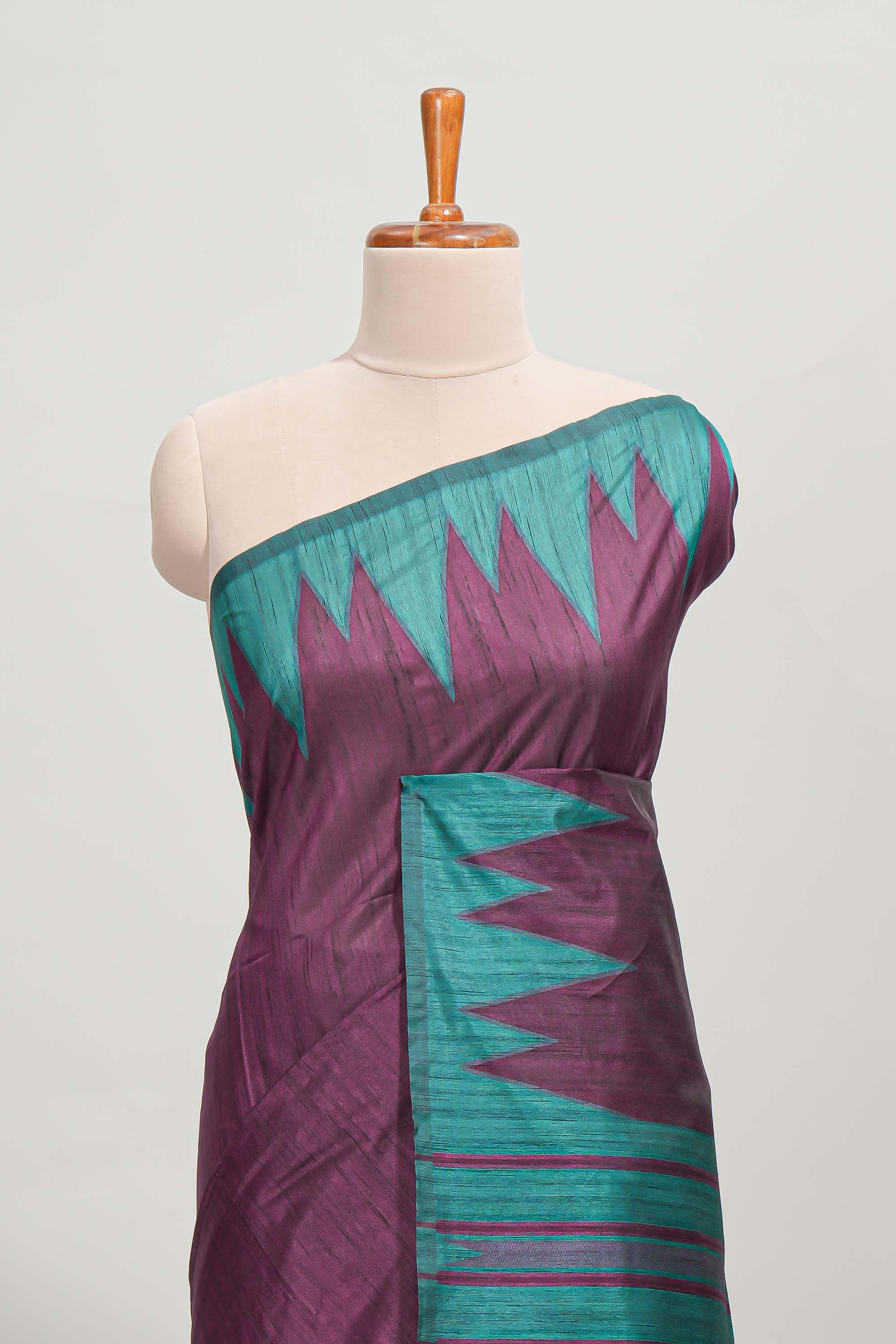 Purple plain semi tussar saree with contrast geometric border and motifs blouse