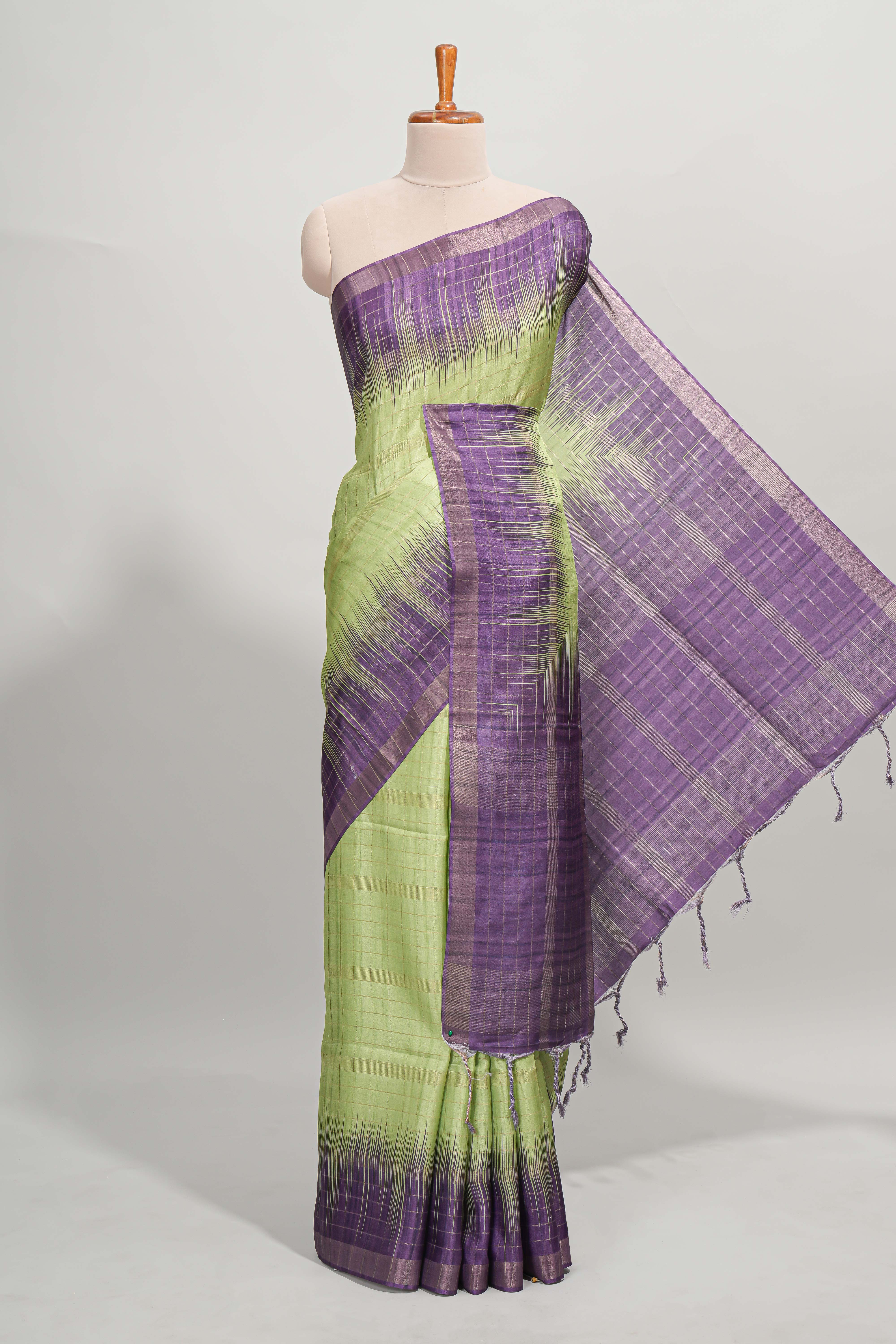 Green checked semi tussar saree with contrast border and striped blouse