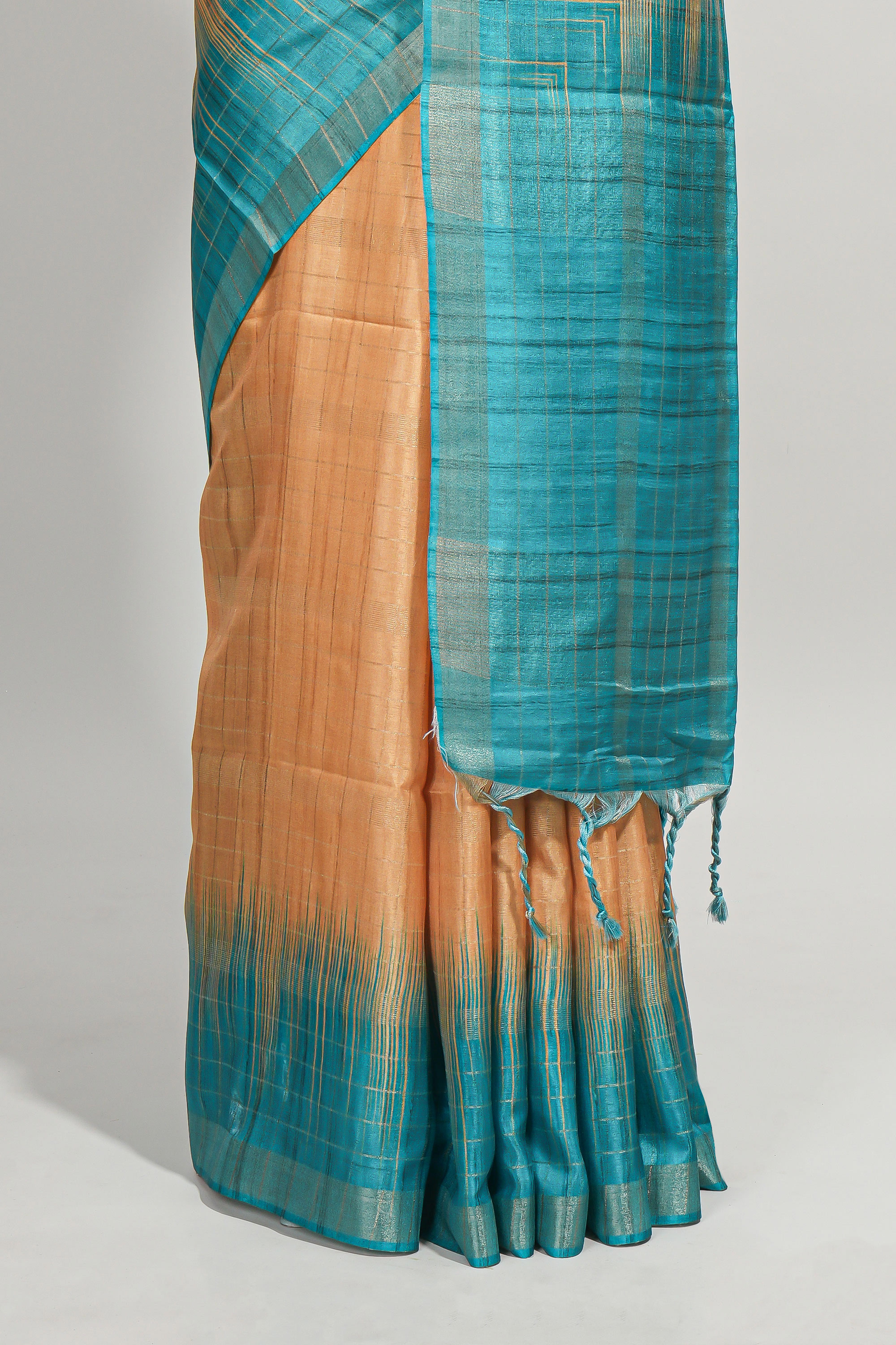 Orange checked semi tussar saree with contrast border and striped blouse