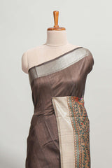 Brown plain semi tussar saree with self border and contrast printed blouse