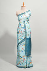 Powder blue checked birds & floral design semi tussar saree with contrast border and checked blouse