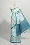 Powder blue checked birds & floral design semi tussar saree with contrast border and checked blouse