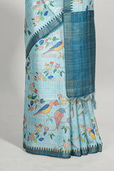Powder blue checked birds & floral design semi tussar saree with contrast border and checked blouse