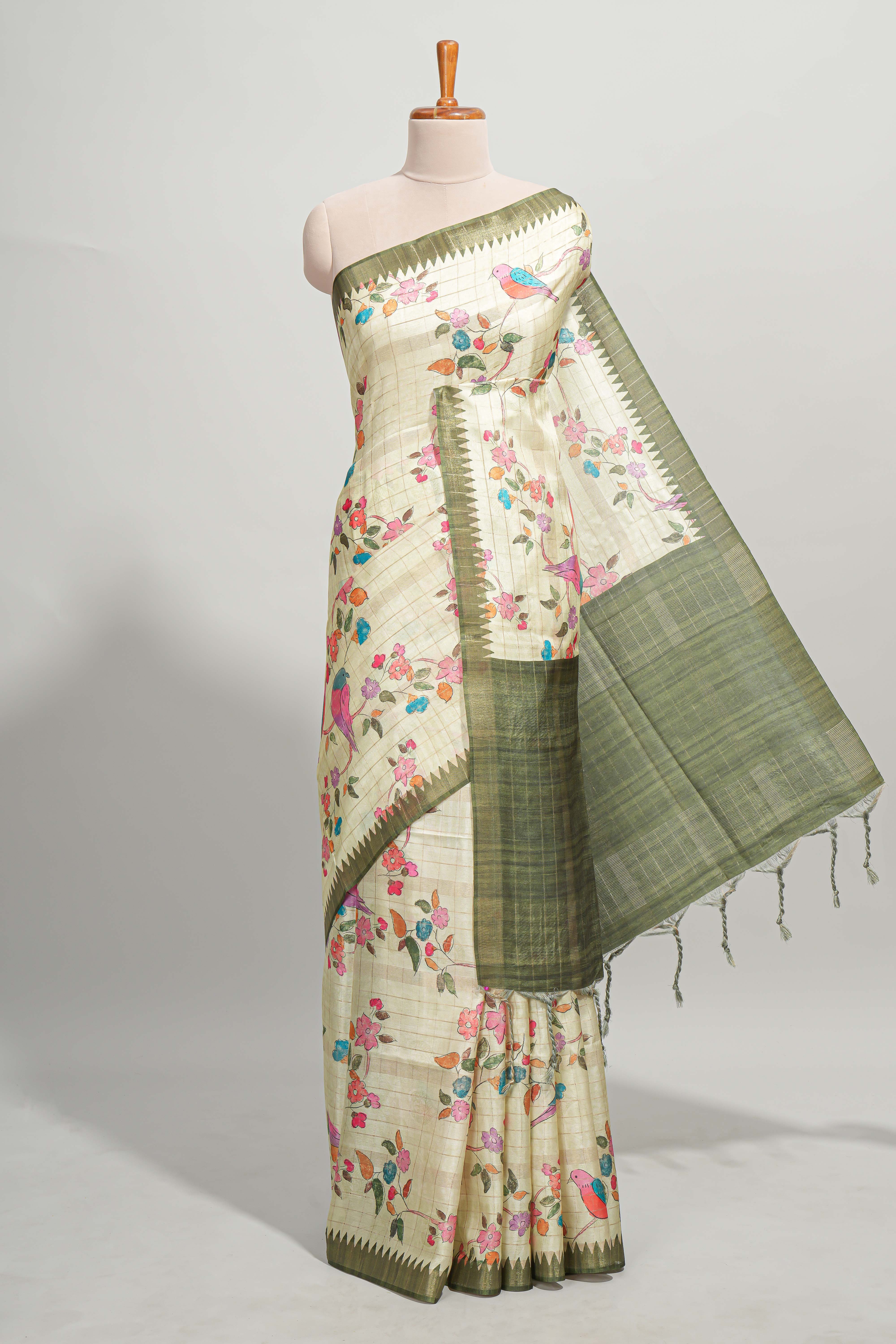 Green checked birds & floral design semi tussar saree with contrast border and checked blouse