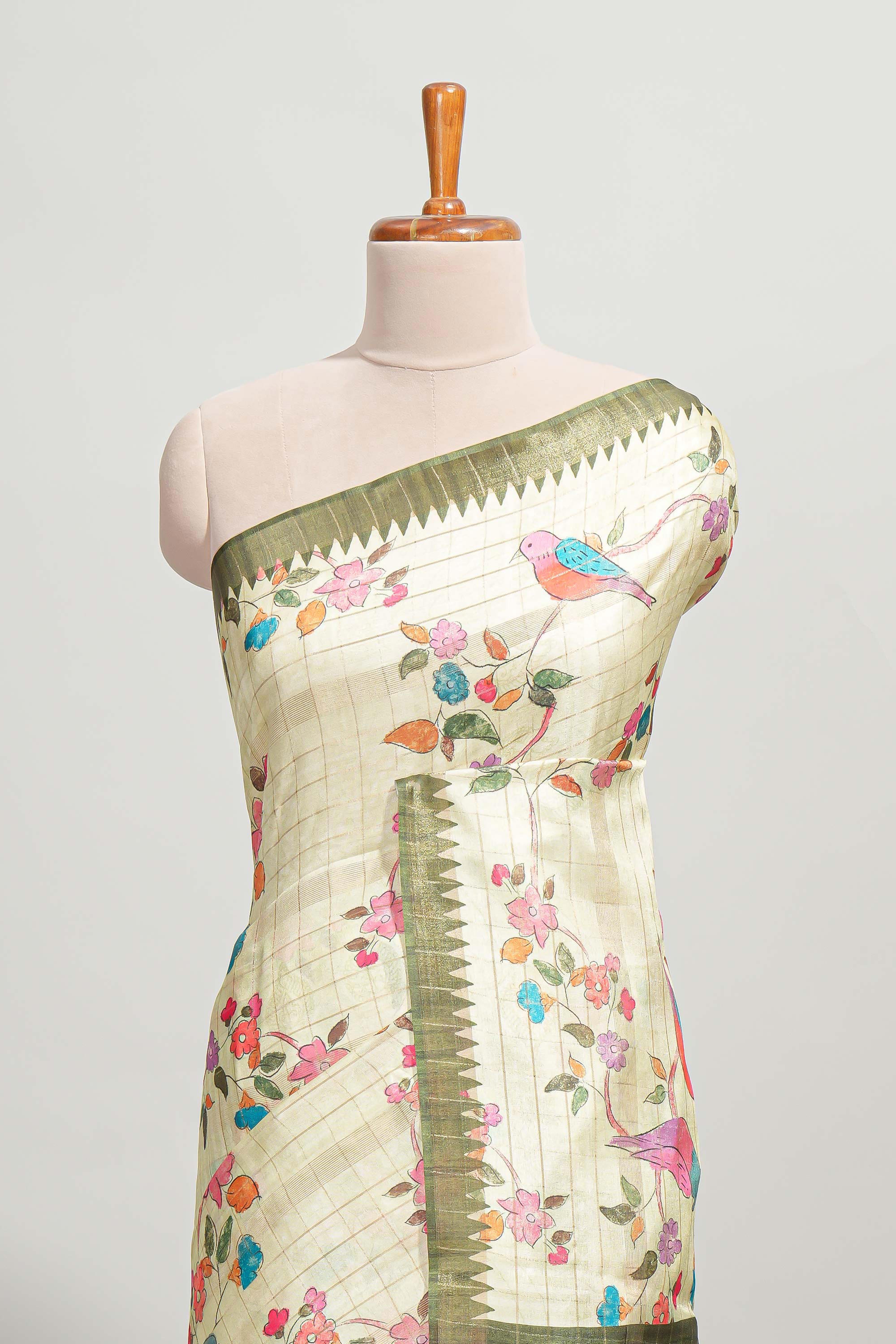 Green checked birds & floral design semi tussar saree with contrast border and checked blouse