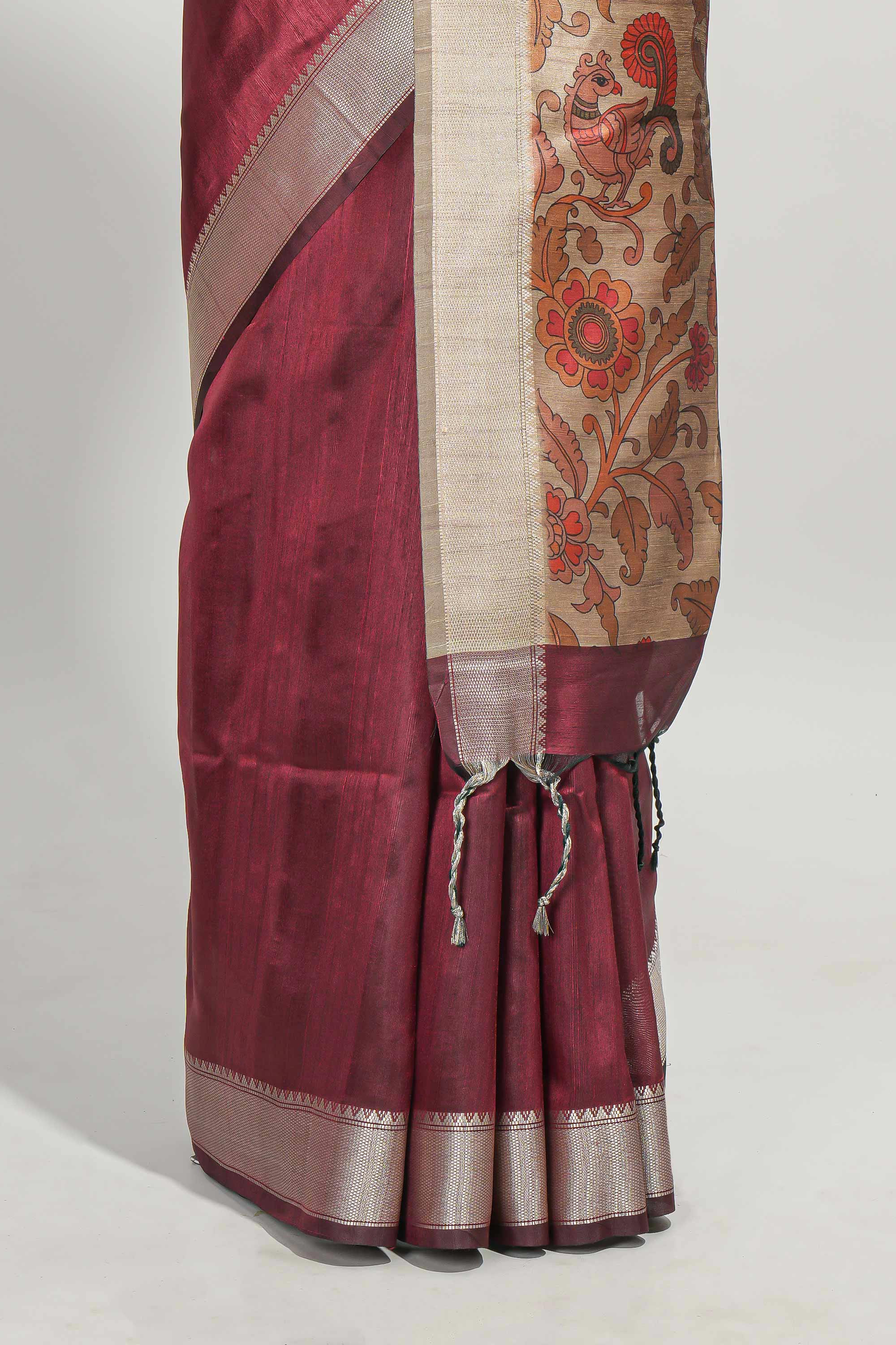Maroon plain semi tussar saree with self border and contrast printed blouse
