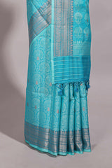 Blue jacquard floral zari motifs design semi tussar saree with self border and matching blouse