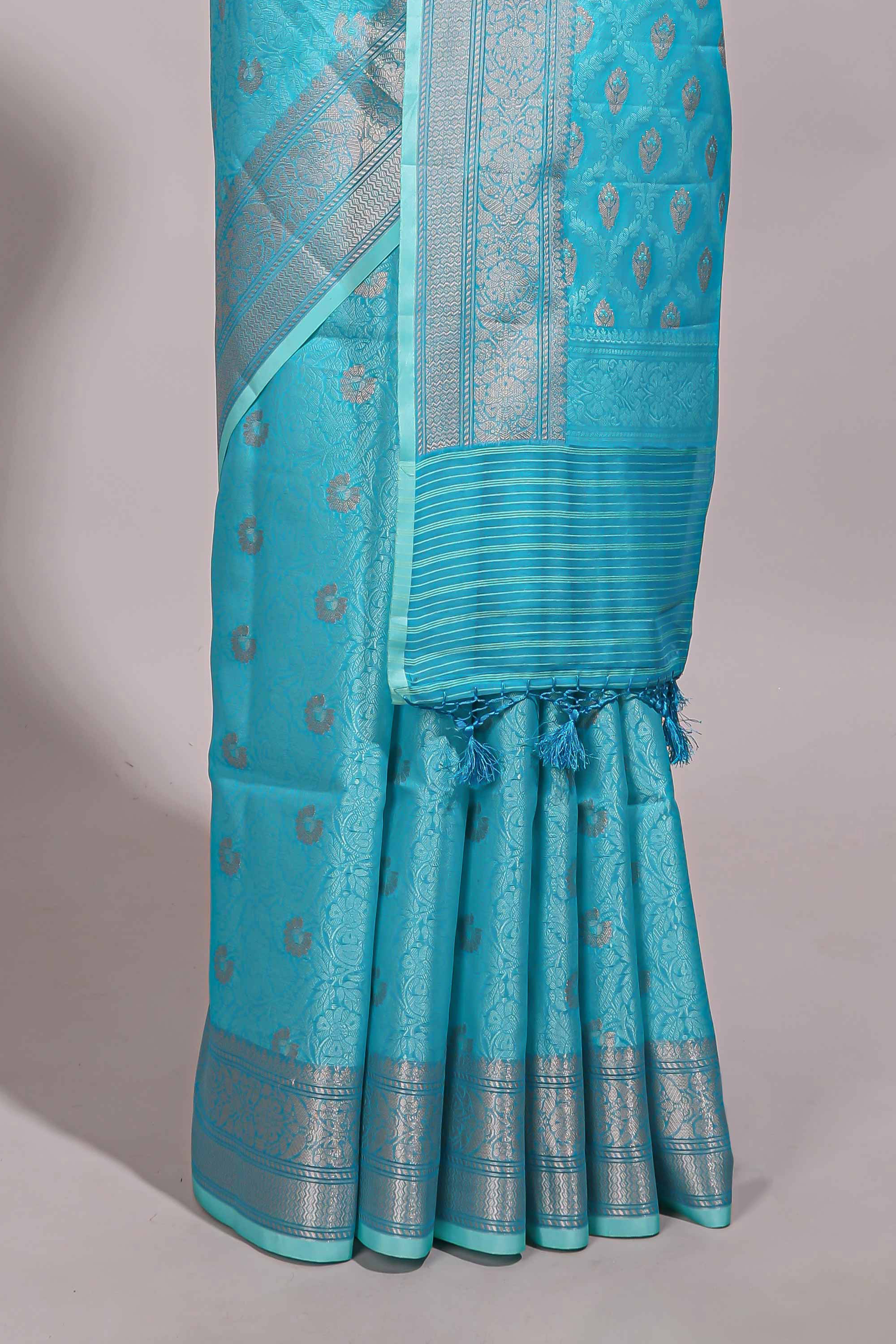Blue jacquard floral zari motifs design semi tussar saree with self border and matching blouse