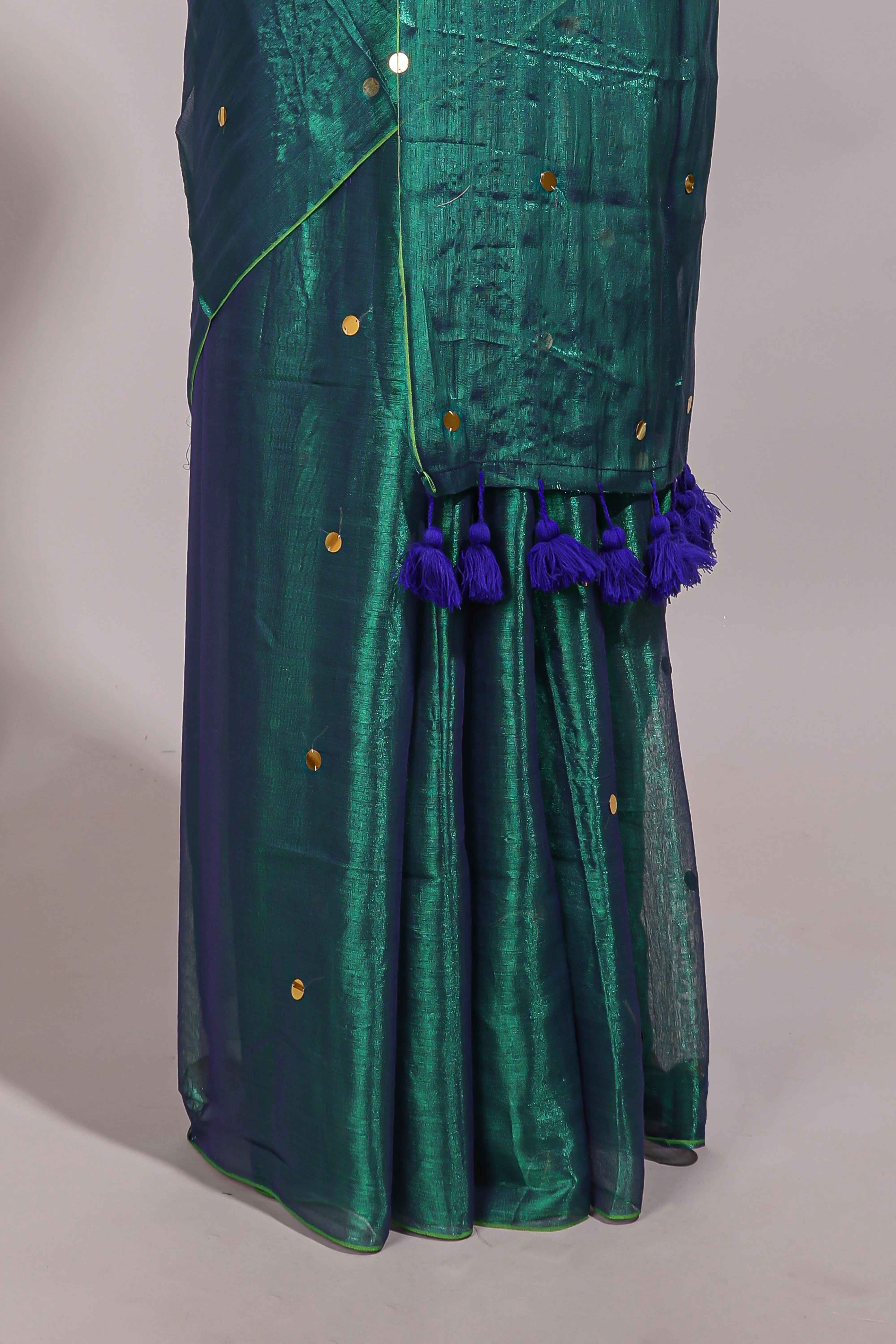 Borderless green sequins embroidery design semi tussar saree with matching blouse and contrast tassels